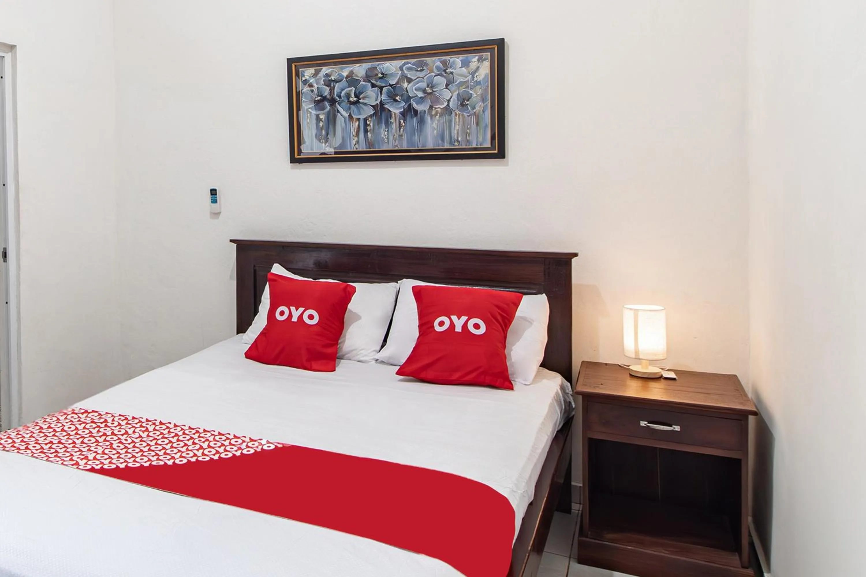 Bedroom in OYO 93482 Penginapan Tenang Lovina