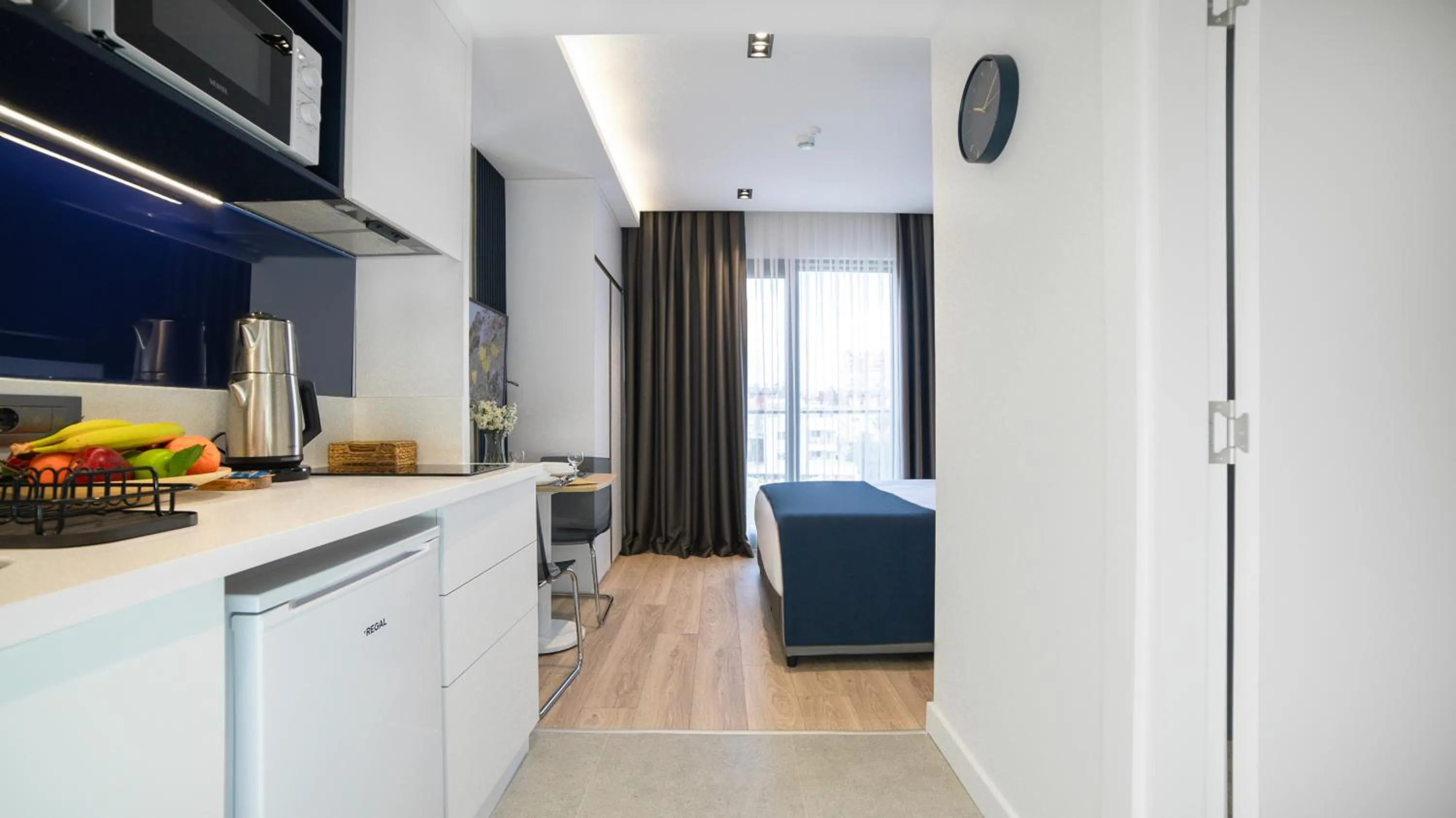 Kitchen or kitchenette, Bed in Stile Suite Marine Hotel