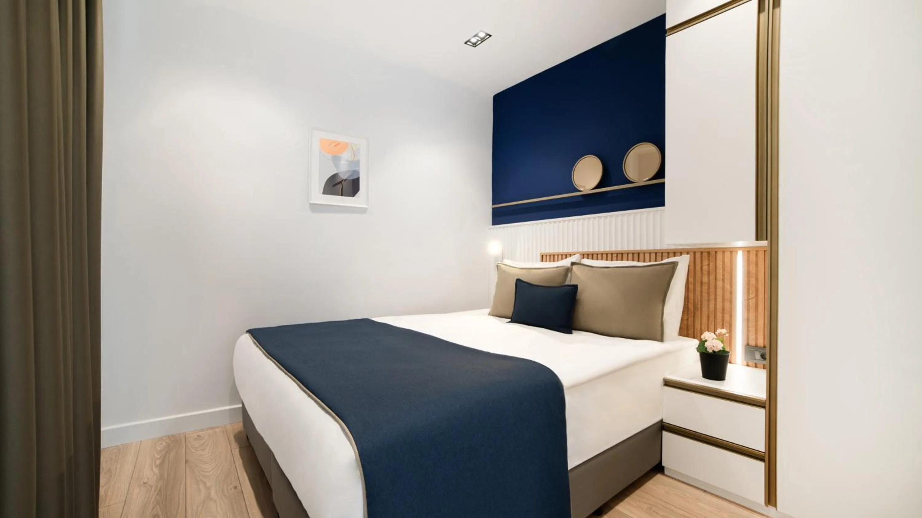 Bed in Stile Suite Marine Hotel