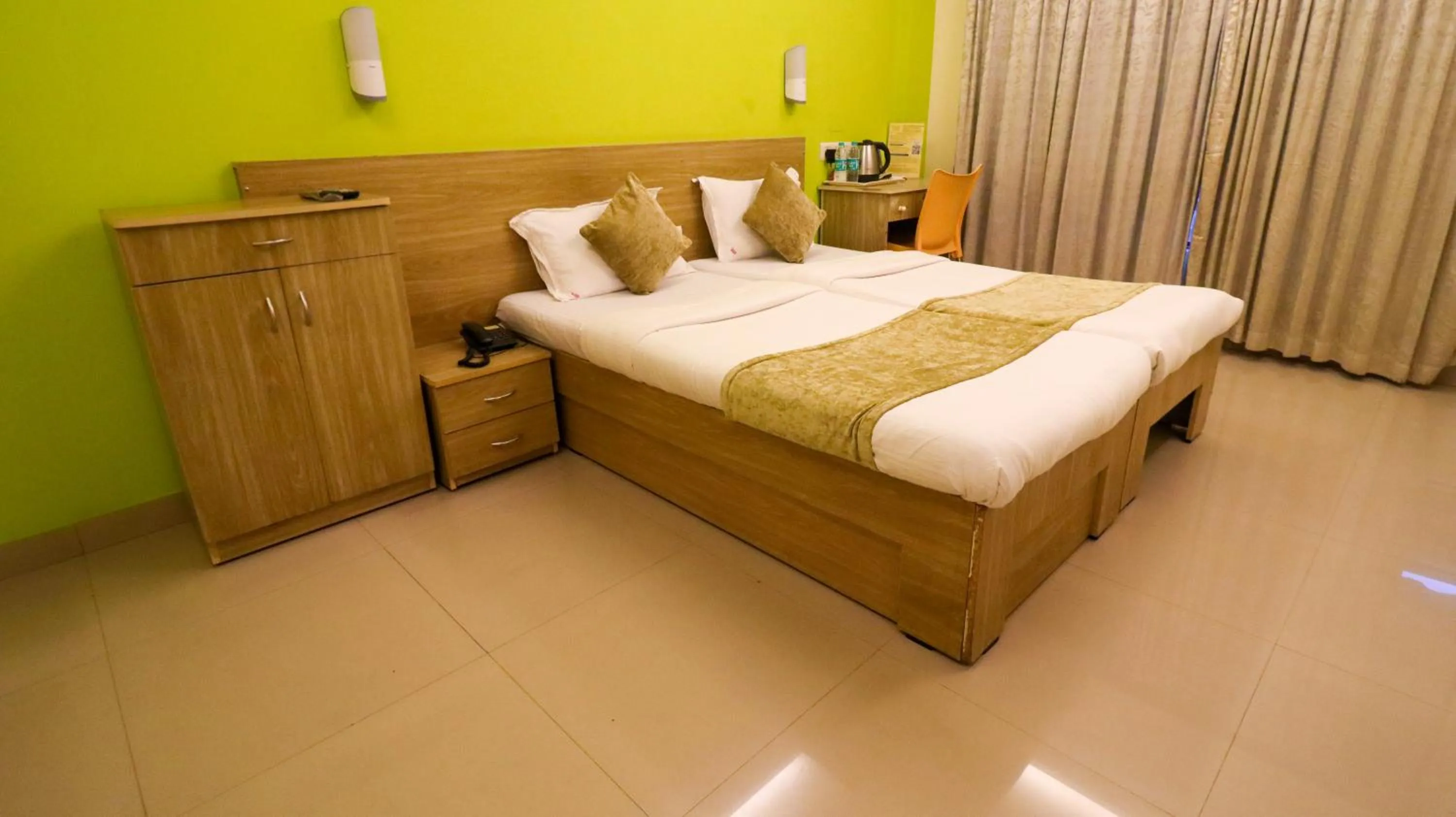 Bed in Tuliip Residency