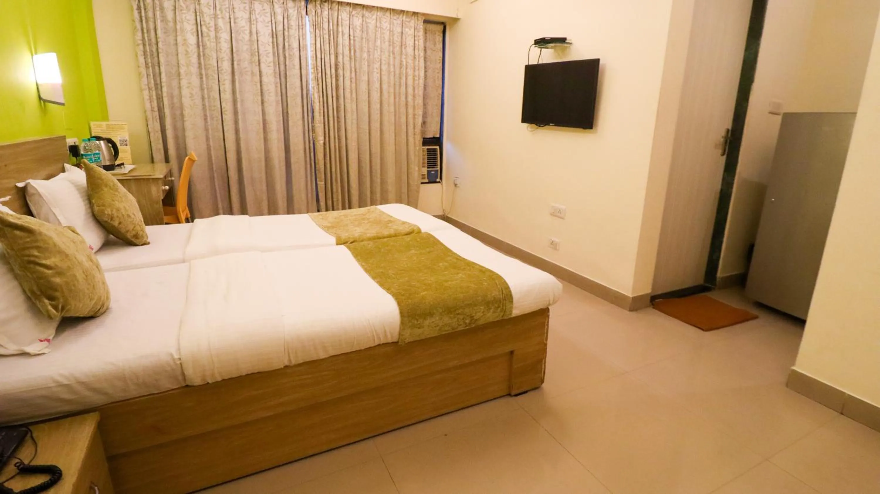 Bed in Tuliip Residency