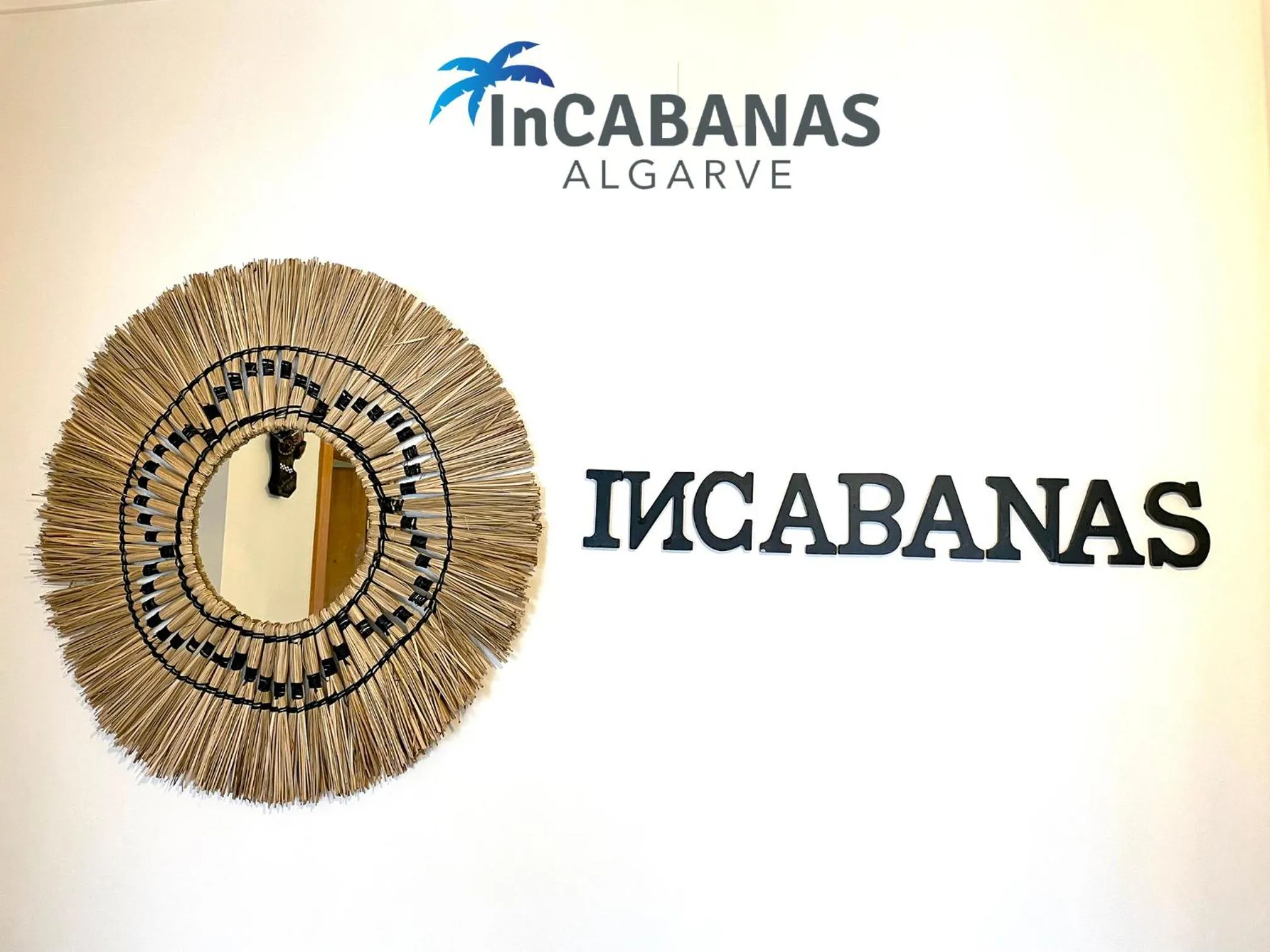 Property logo or sign in InCabanas