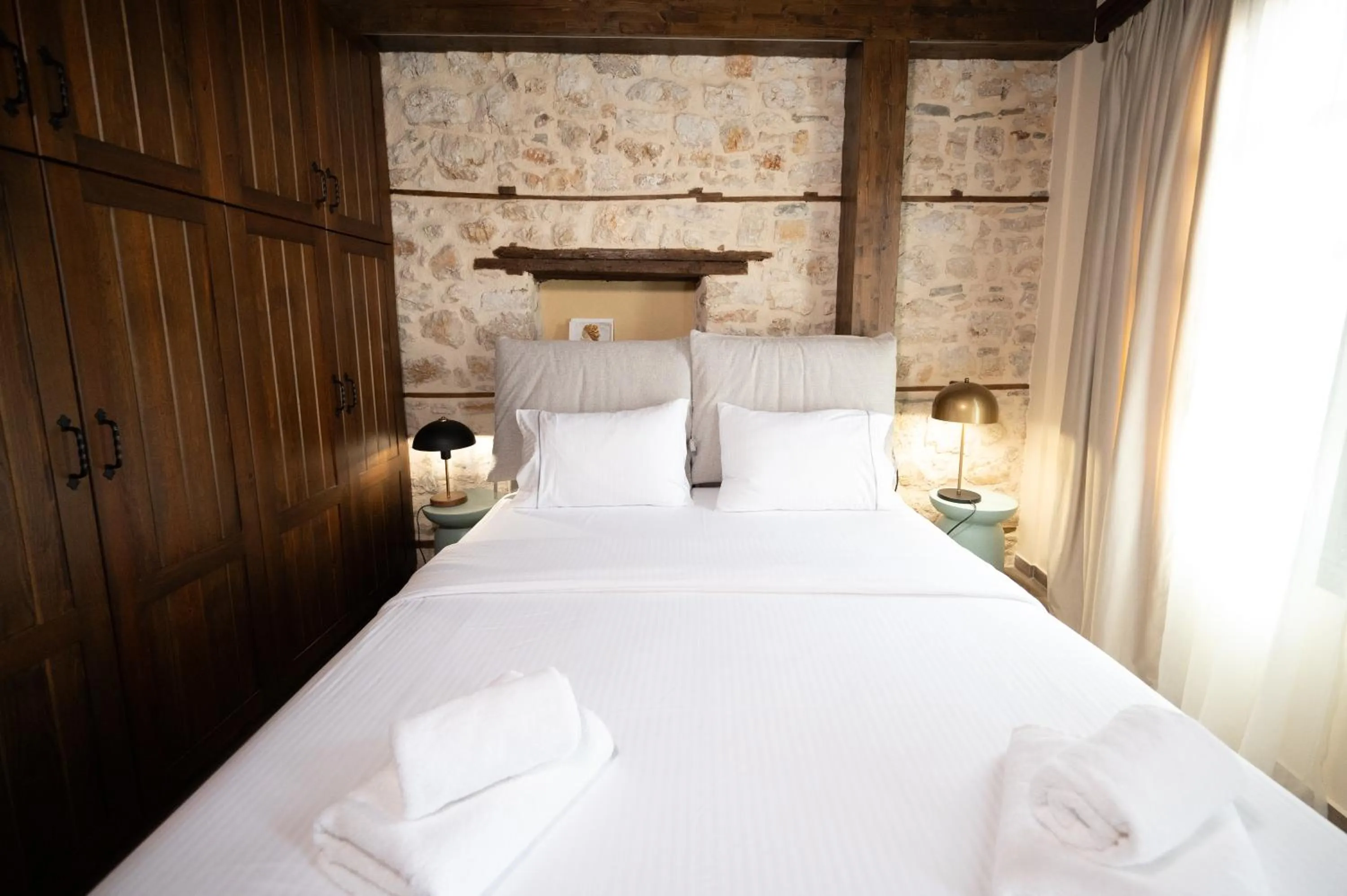 Bed in Bodrum Suites