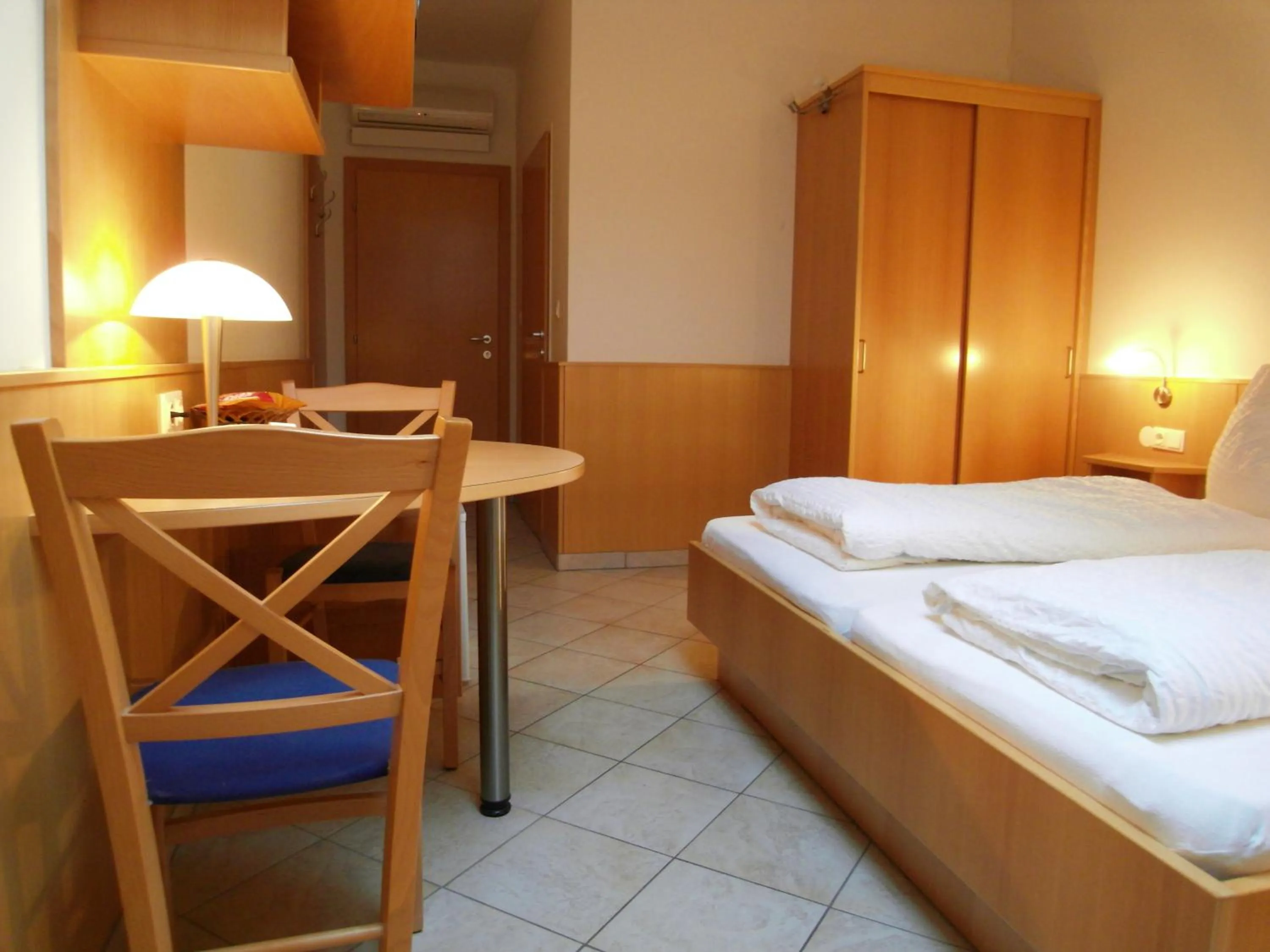 Bed in Weinhotel Kirchenwirt