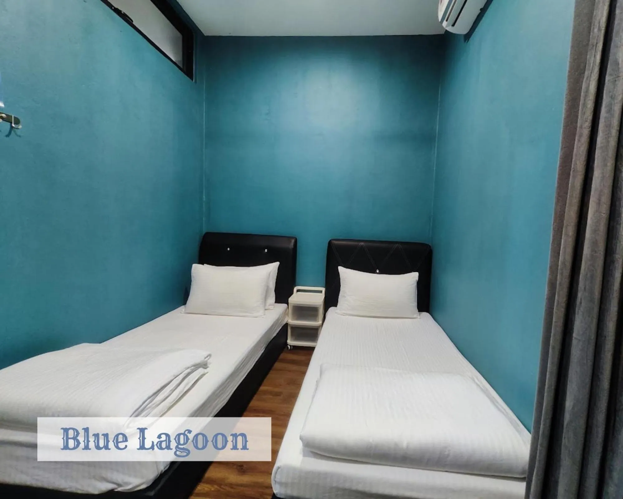 Bed in Roxy Sematan Townhouse - Blue Lagoon