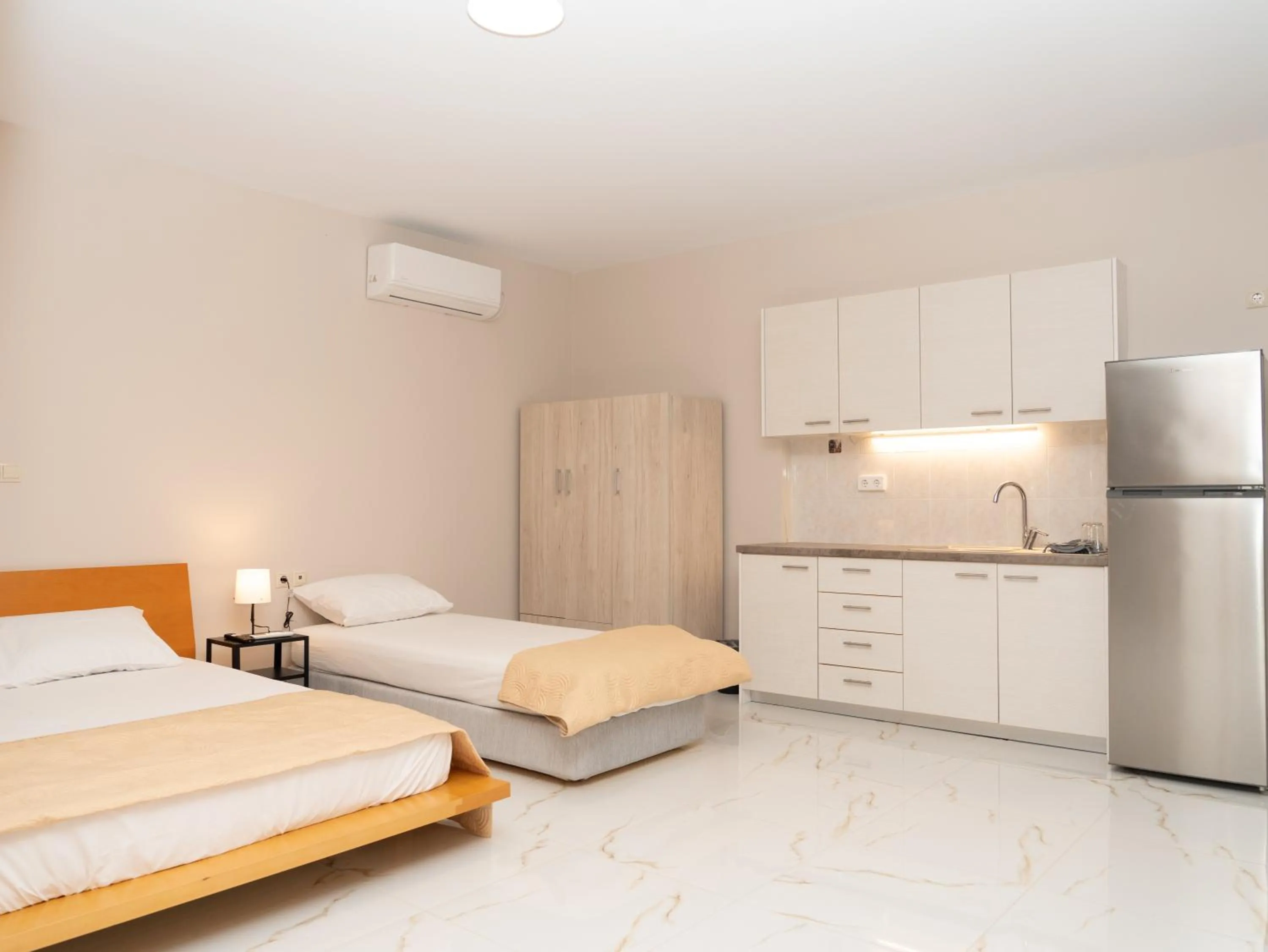 Bed in ALLAGIANNIS GROUP APARTMENTS