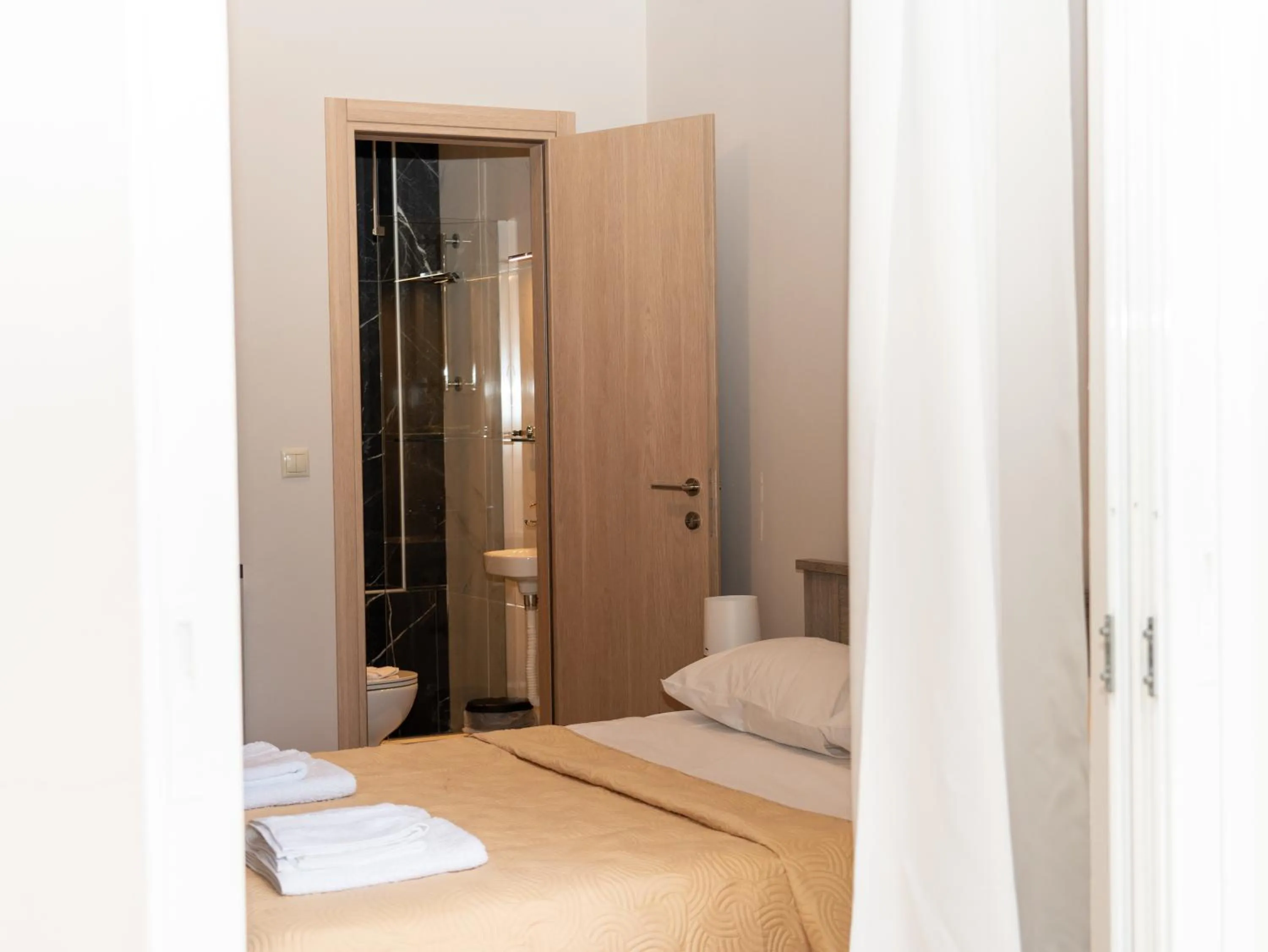 Bed in ALLAGIANNIS GROUP APARTMENTS