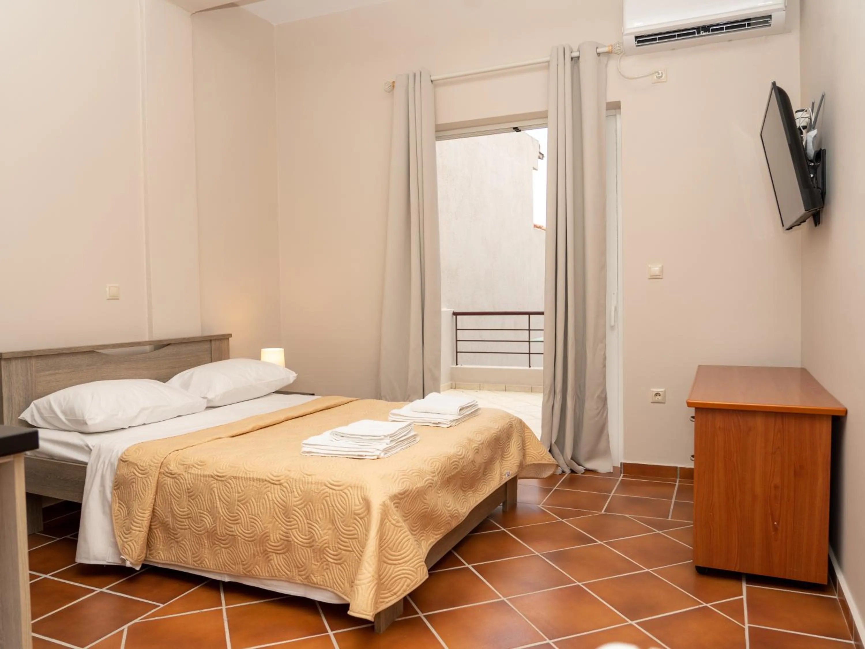 Bed in ALLAGIANNIS GROUP APARTMENTS