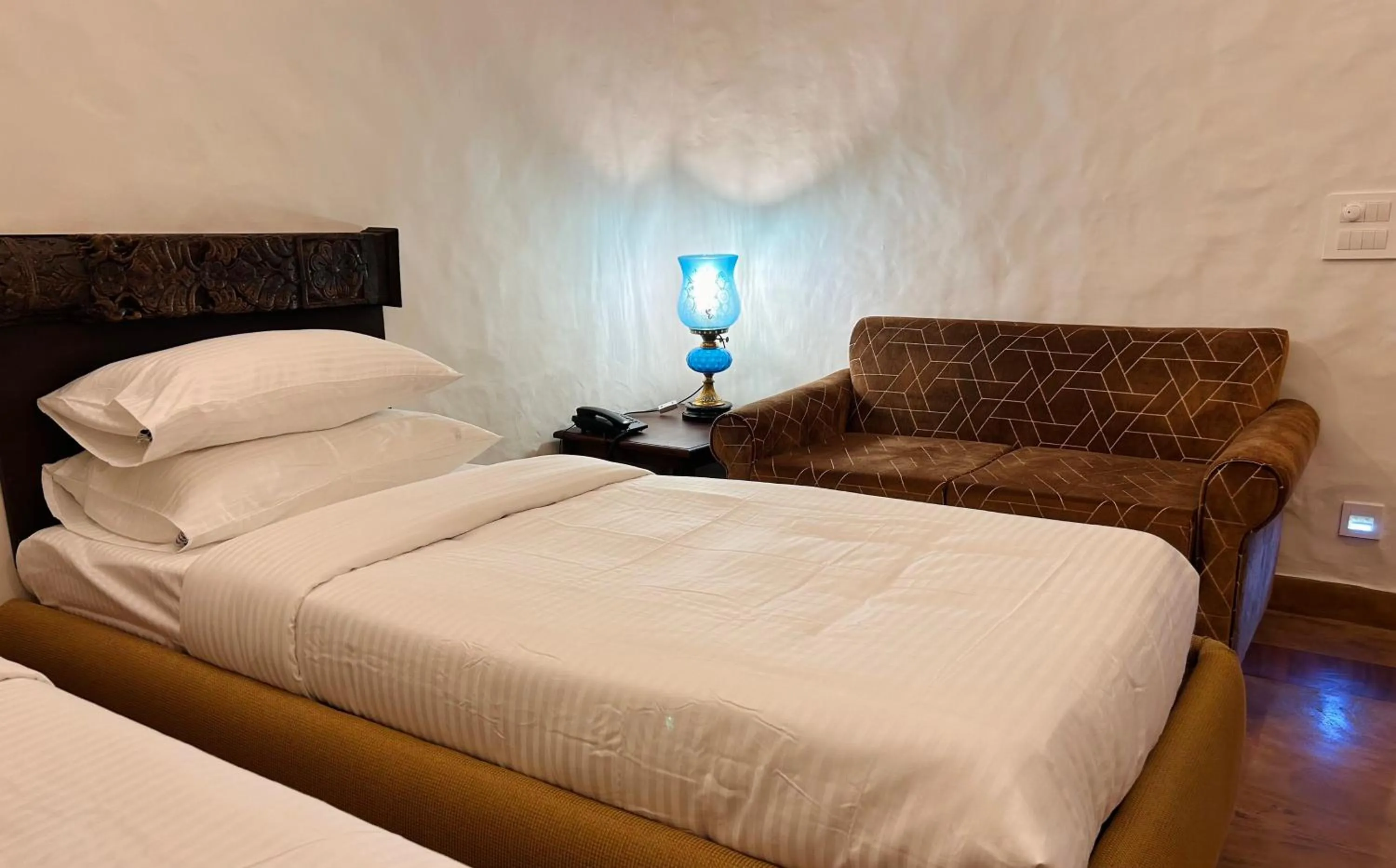 Bed in The Kaptain's Retreat