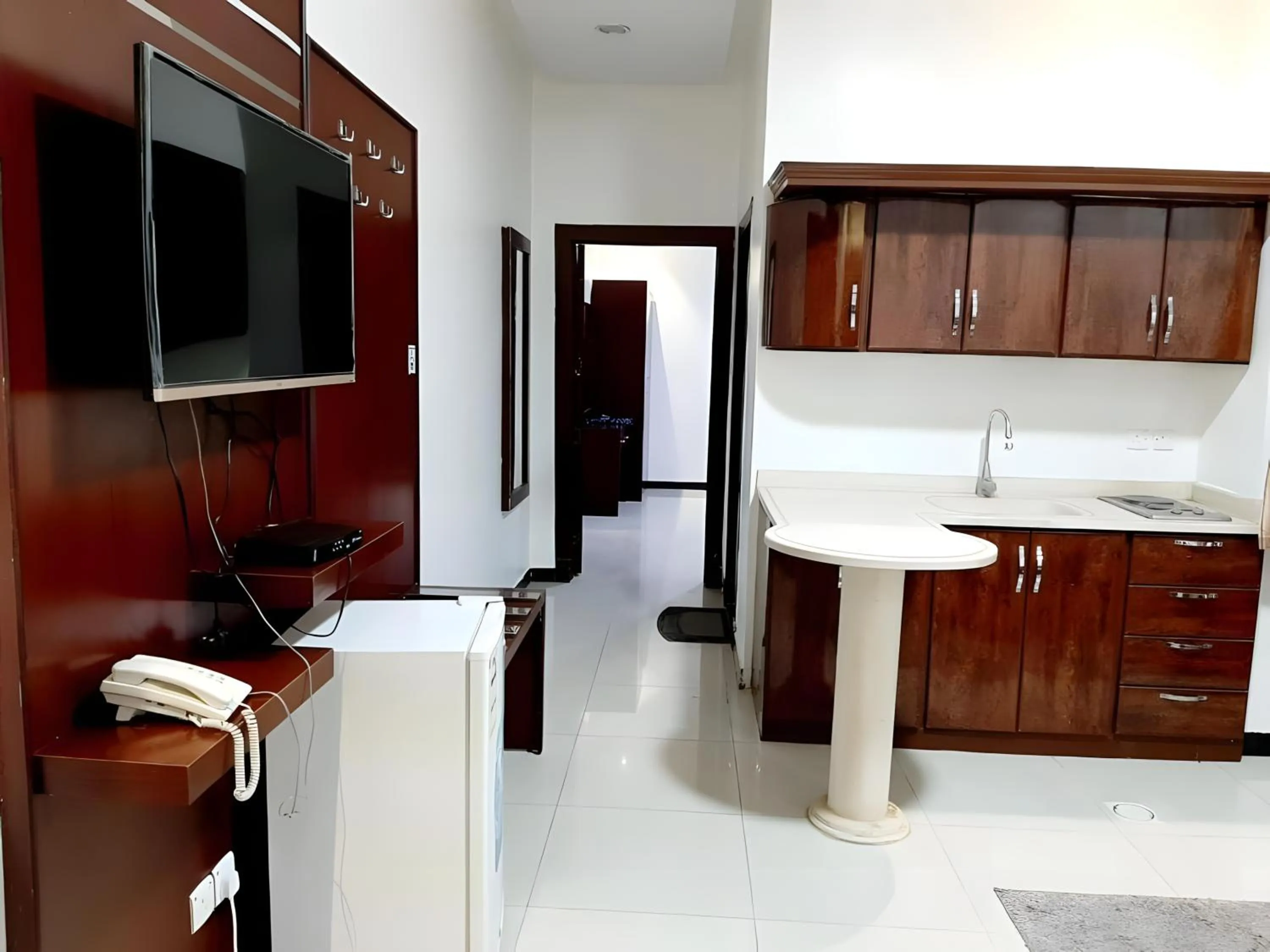 TV and multimedia in شقق أهلين ثلاثة للشقق المخدومة