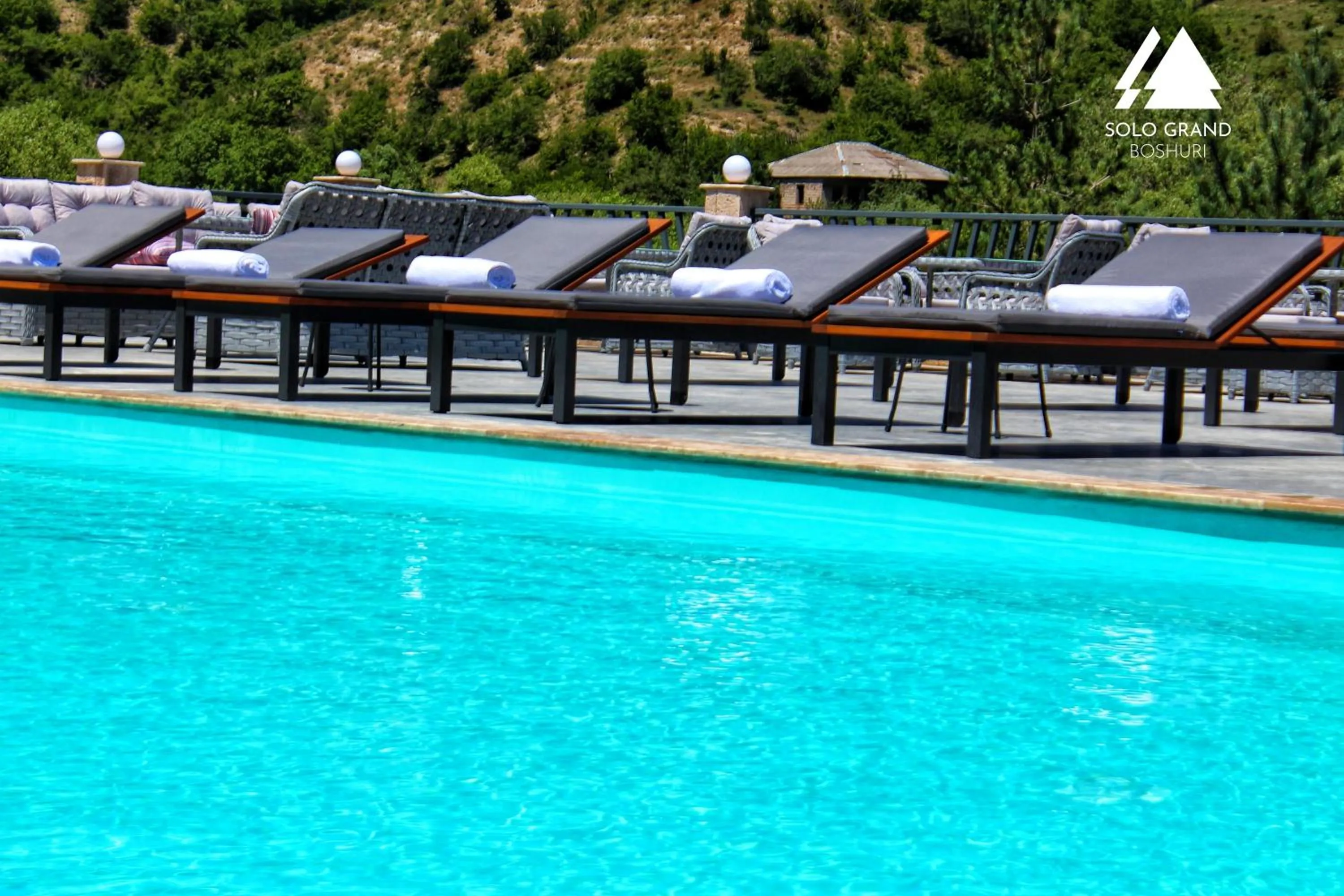 Swimming pool in Solo Grand Boshuri Hotel Wellness Resort