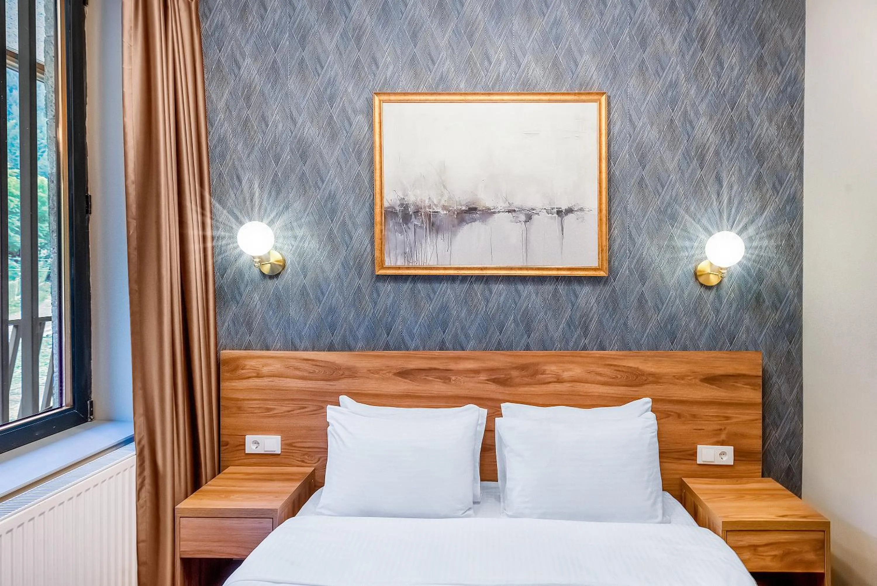 Bed in Solo Grand Boshuri Hotel Wellness Resort