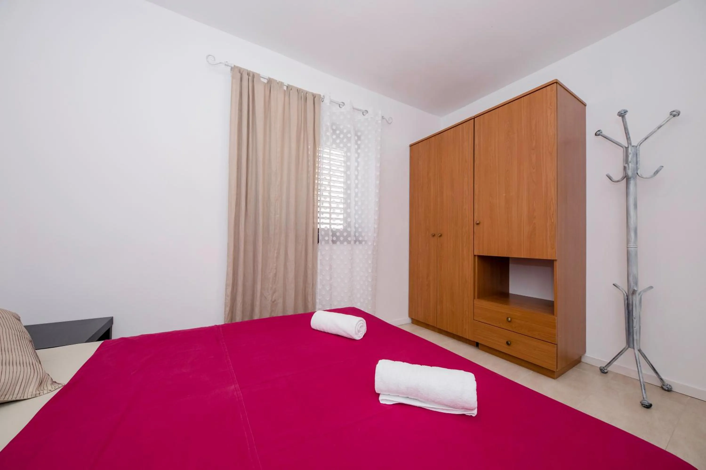 Bed in Miral Apartments