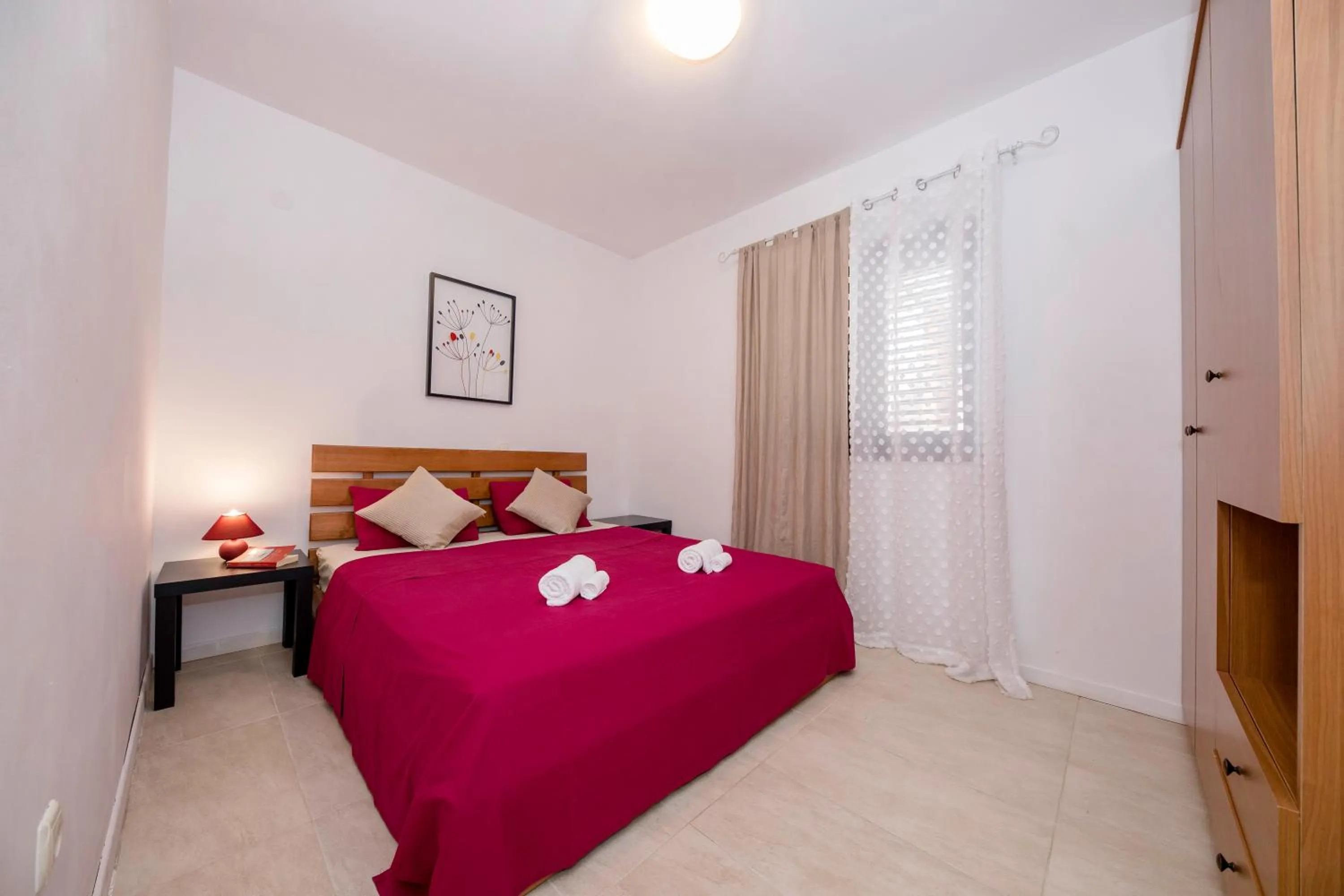 Bed in Miral Apartments