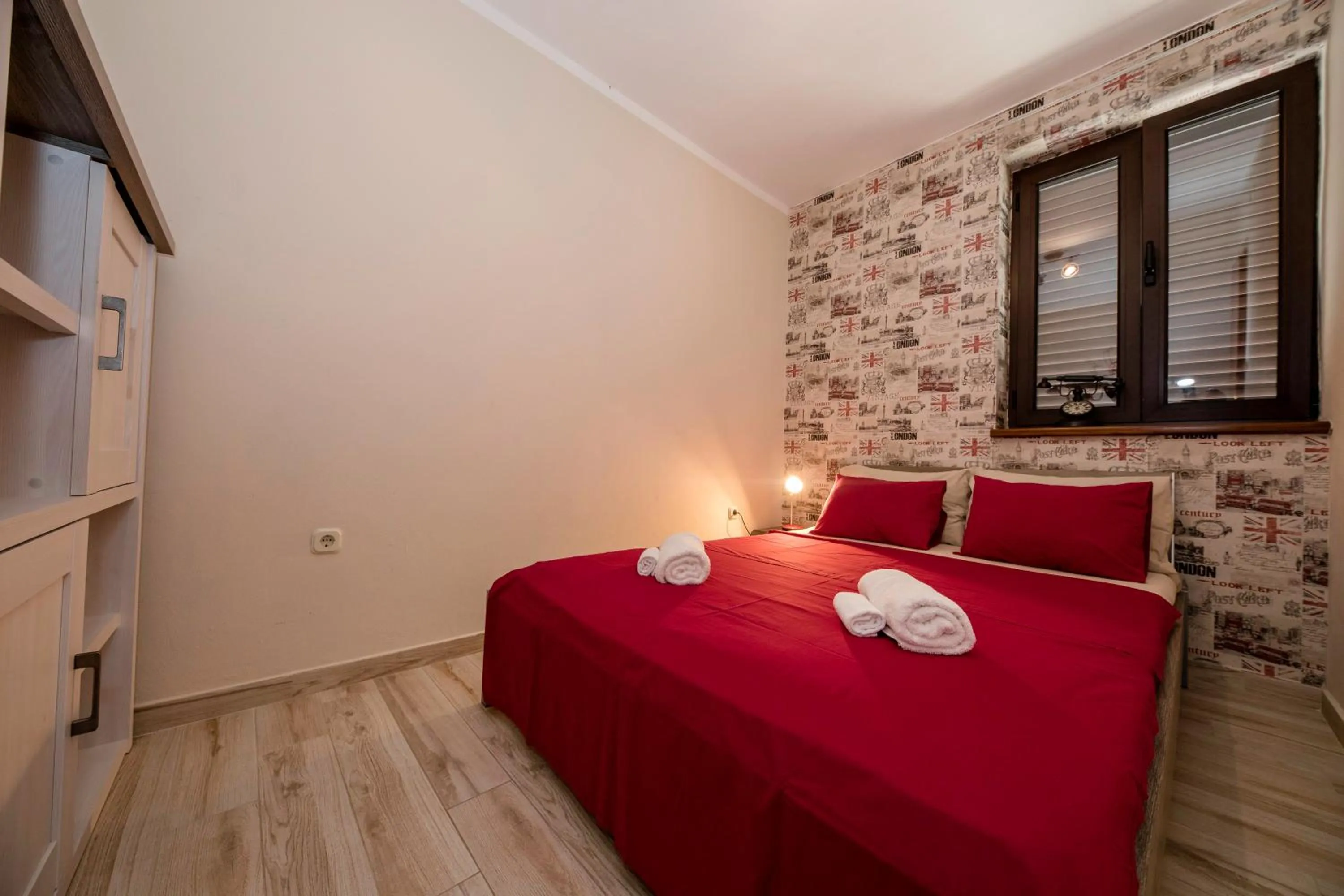 Bed in Apartments by the Beach with Pool and Lounge Beds - Miral Apartments