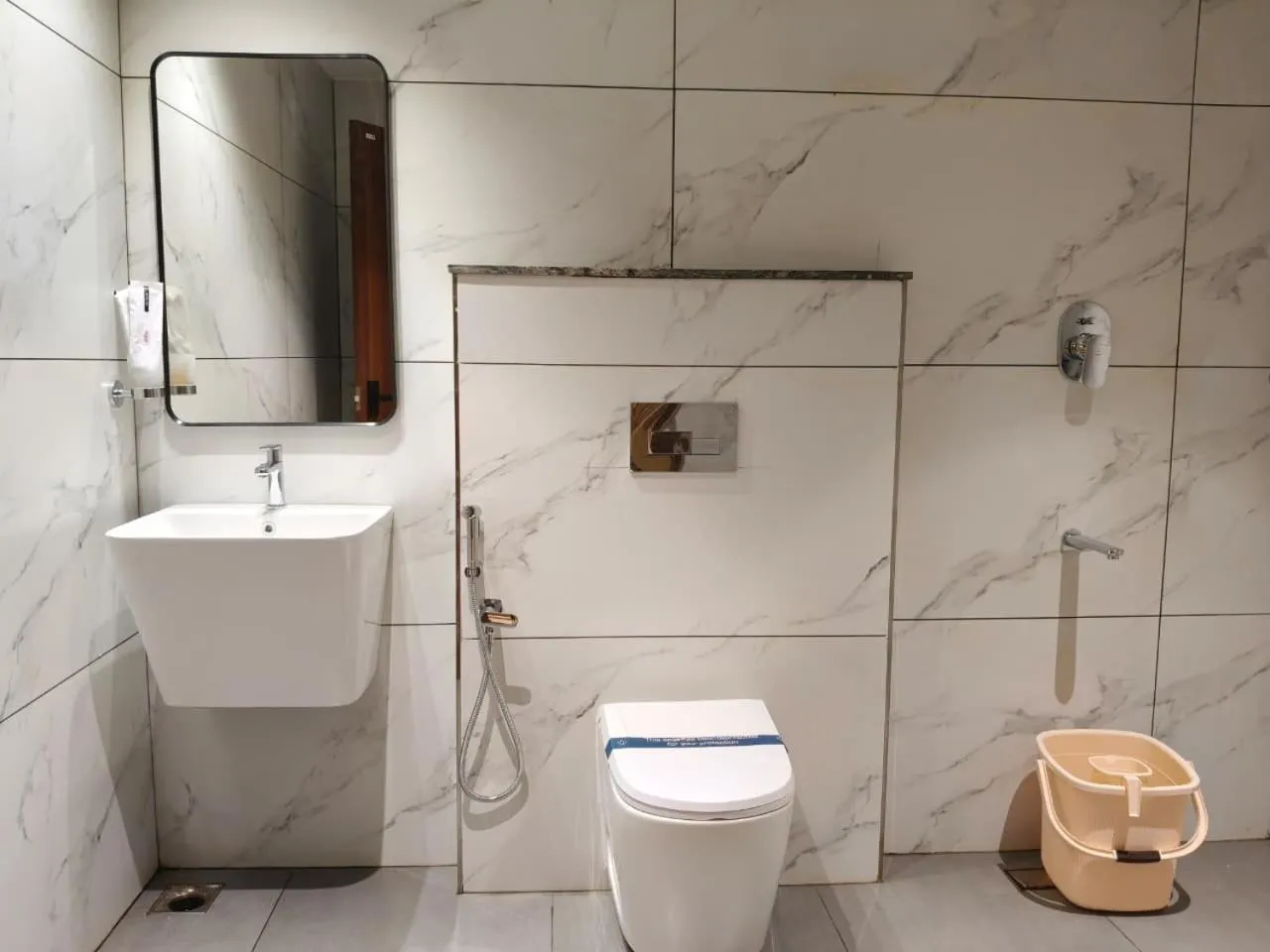 Toilet in Mayo Suites