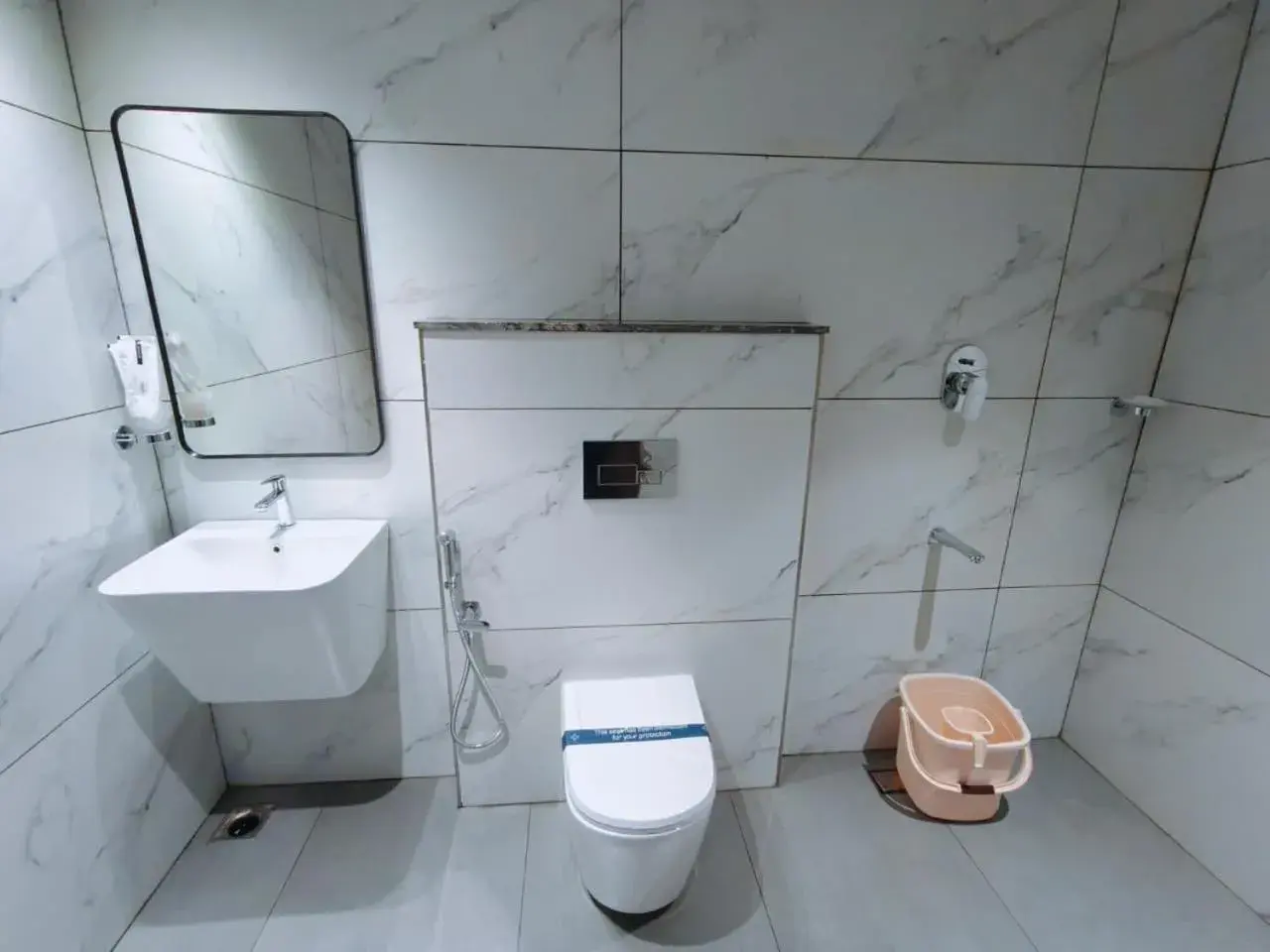 Toilet in Mayo Suites Toilet in Mayo Suites