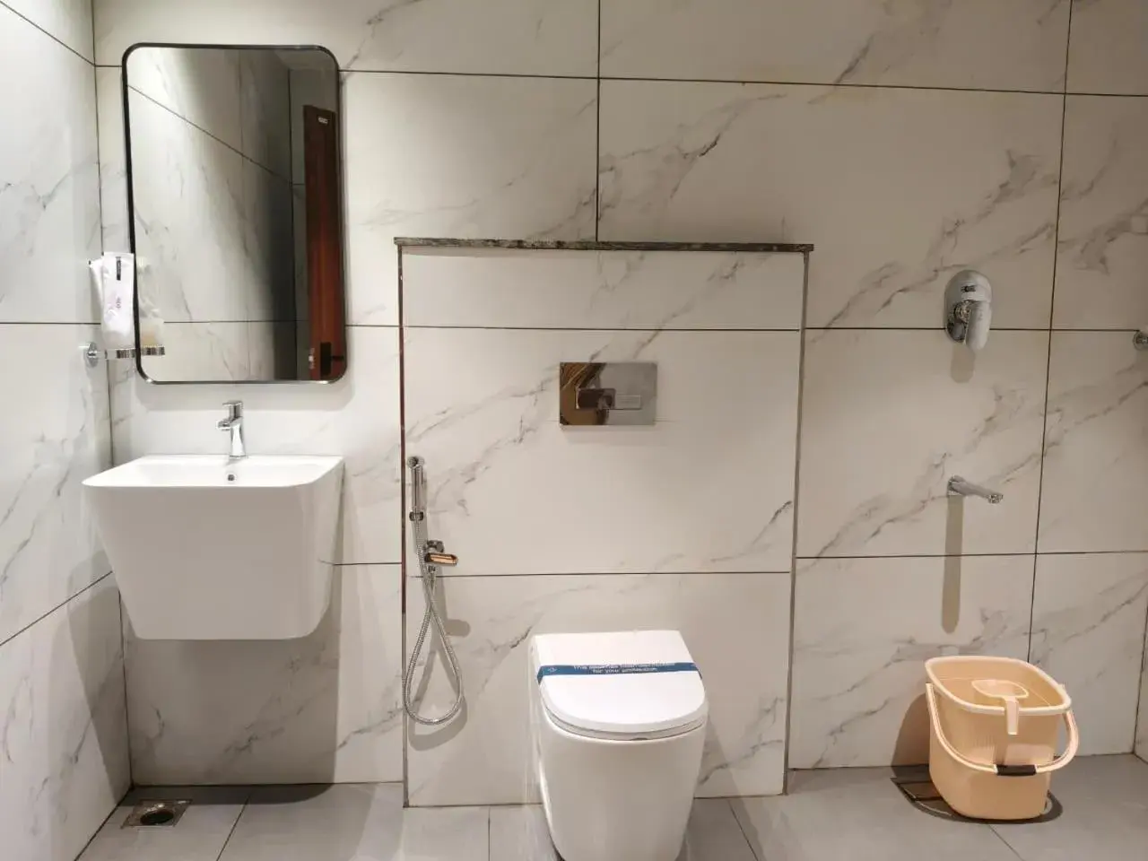 Toilet in Mayo Suites Toilet in Mayo Suites