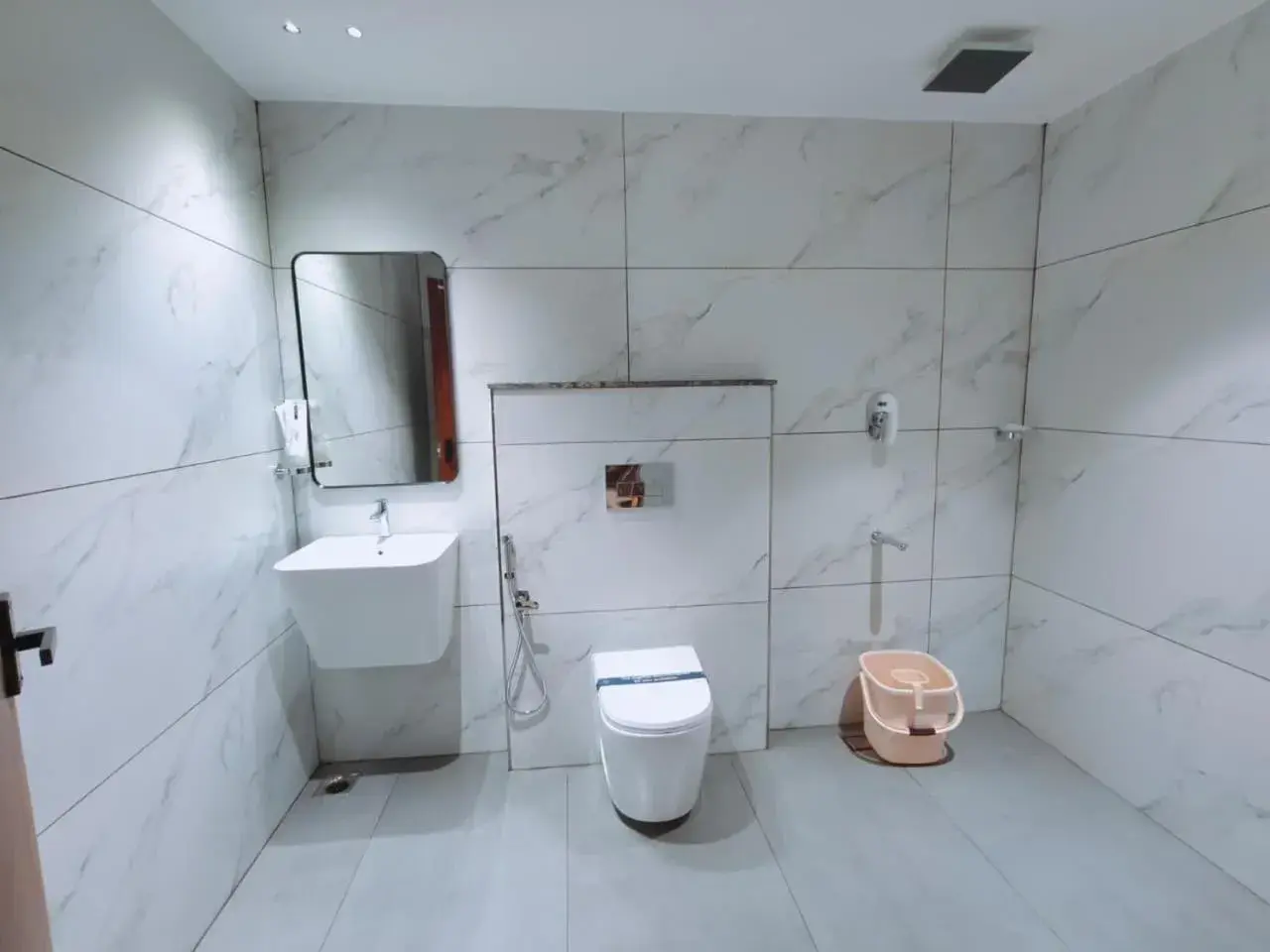 Toilet in Mayo Suites Toilet in Mayo Suites