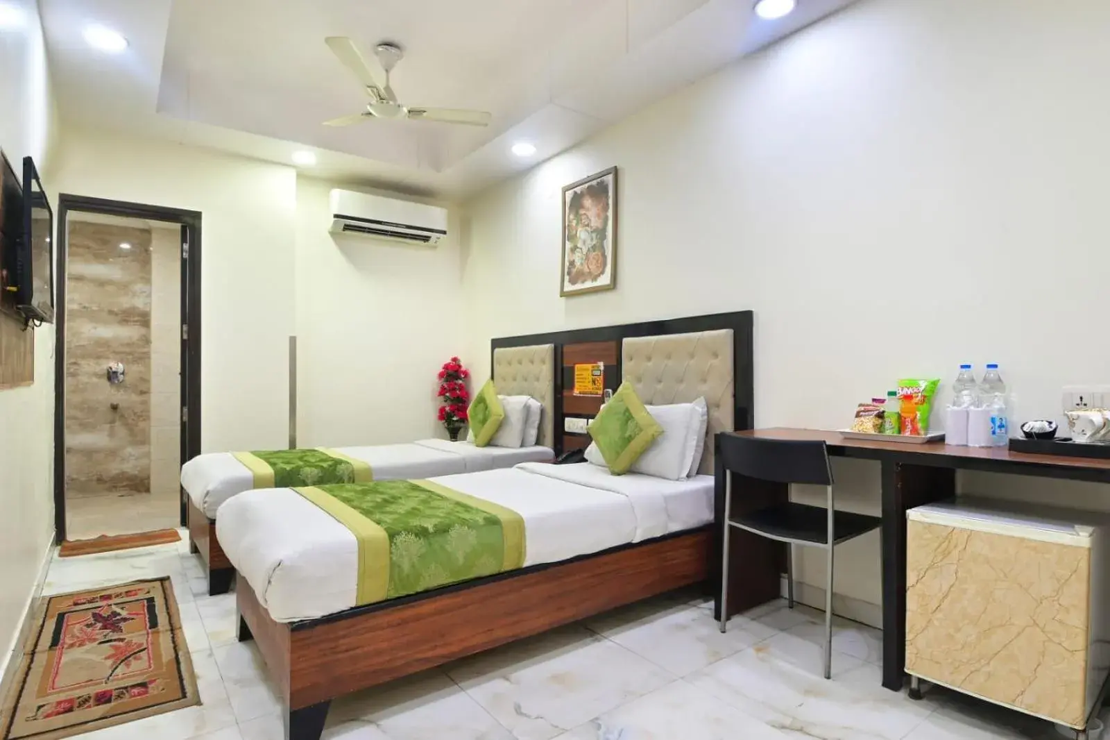 Bedroom, Bed in Hotel Emporio Near New Delhi Railway Station - Paharganj Bedroom, Bed in Hotel Emporio Near New Delhi Railway Station - Paharganj