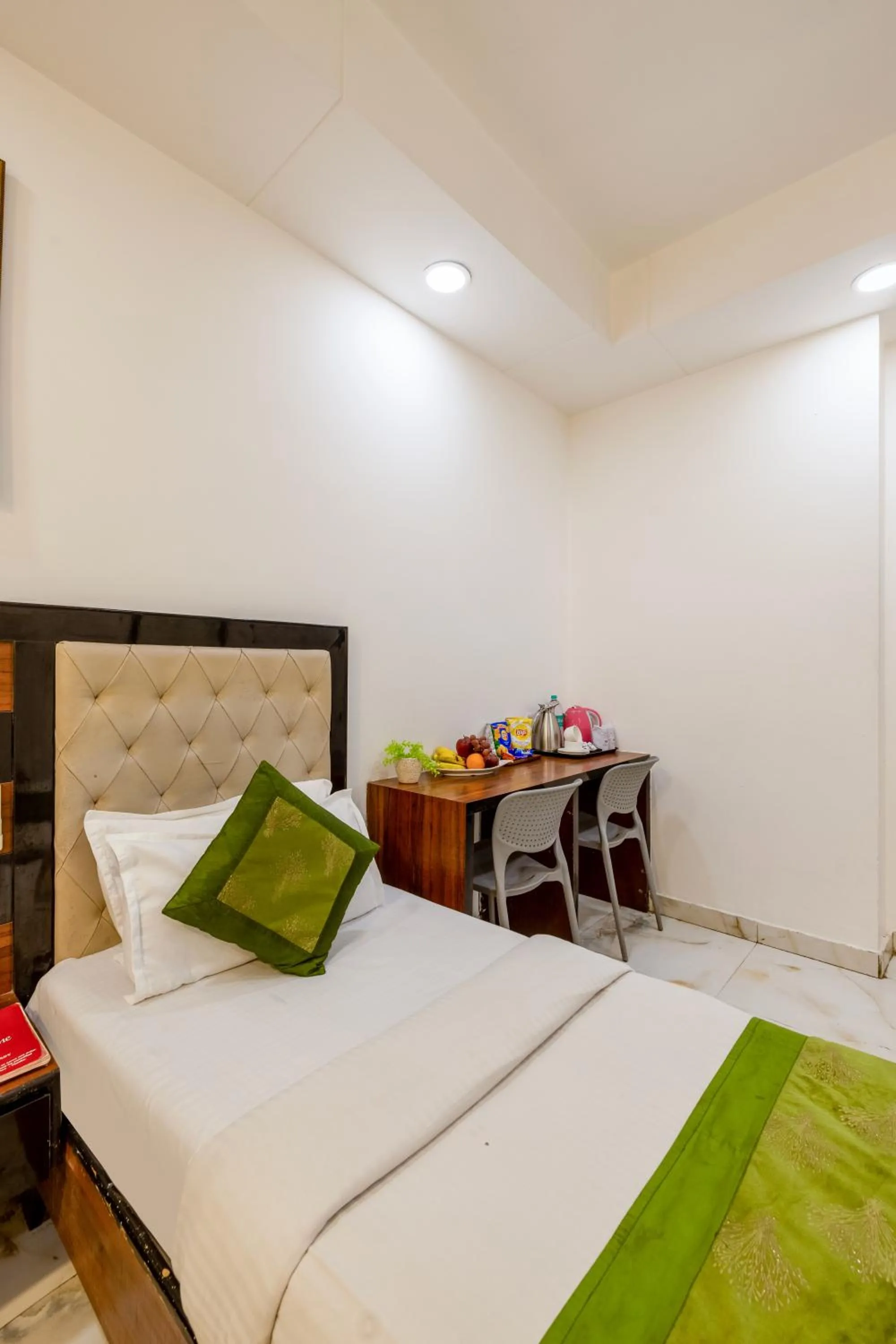 Photo of the whole room, Bed in Hotel Emporio Near New Delhi Railway Station - Paharganj