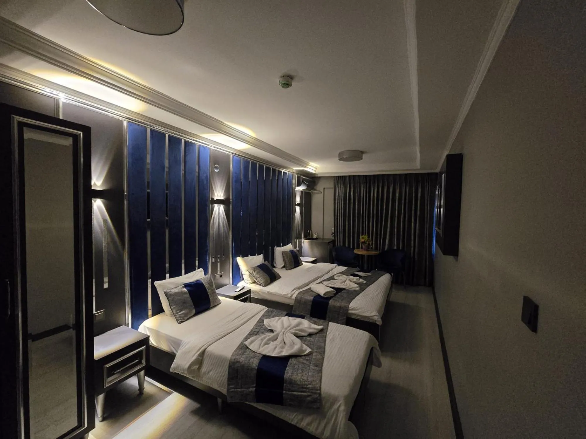 Bed in BLUE PLUS HOTEL