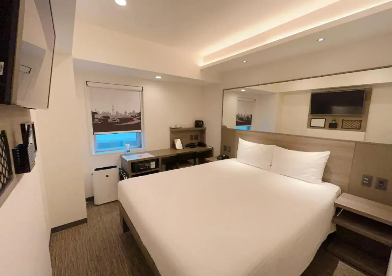 Photo of the whole room, Bed in Smile Hotel Sapporo Susukino Minami Photo of the whole room, Bed in Smile Hotel Sapporo Susukino Minami