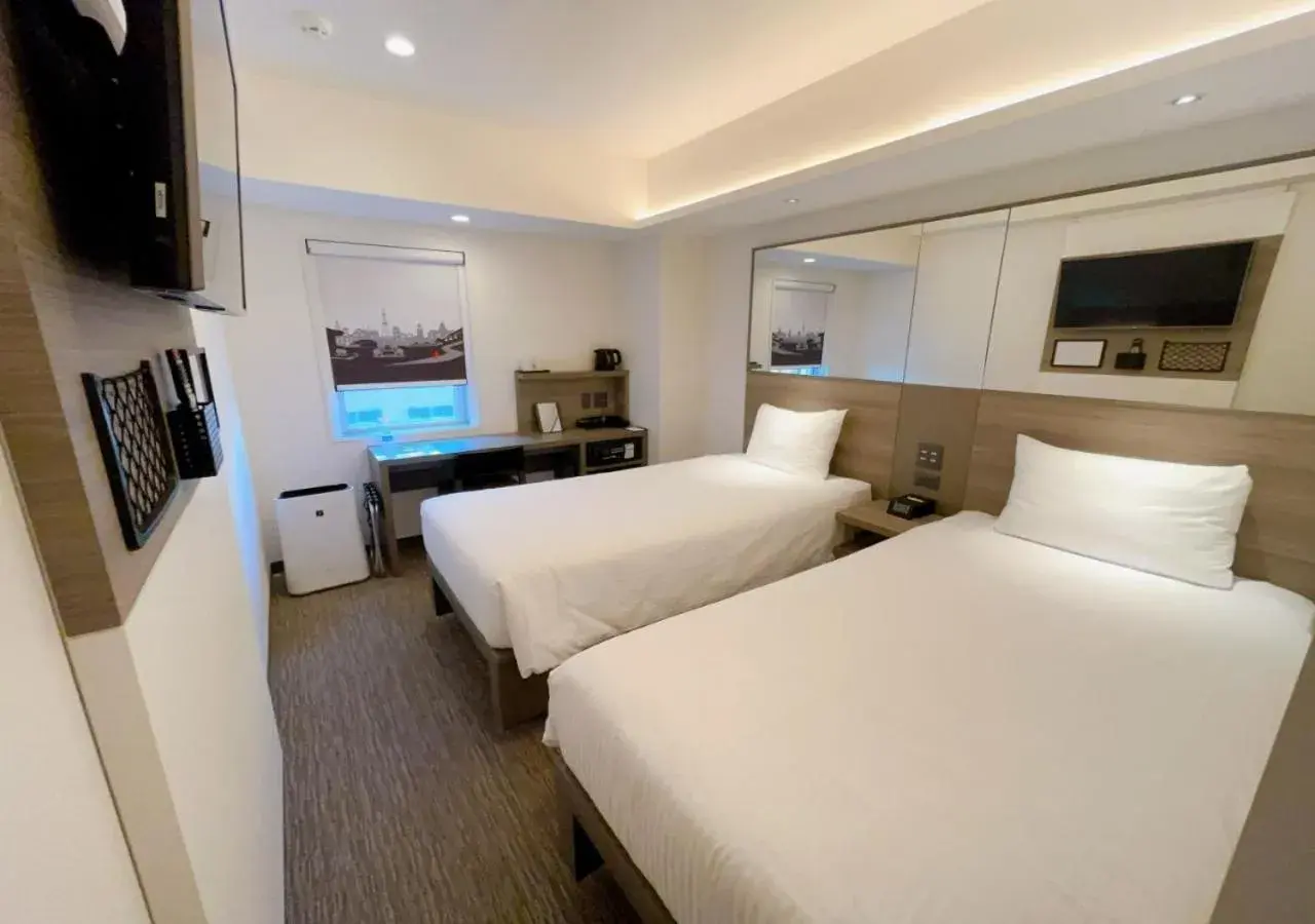 Photo of the whole room, Bed in Smile Hotel Sapporo Susukino Minami Photo of the whole room, Bed in Smile Hotel Sapporo Susukino Minami