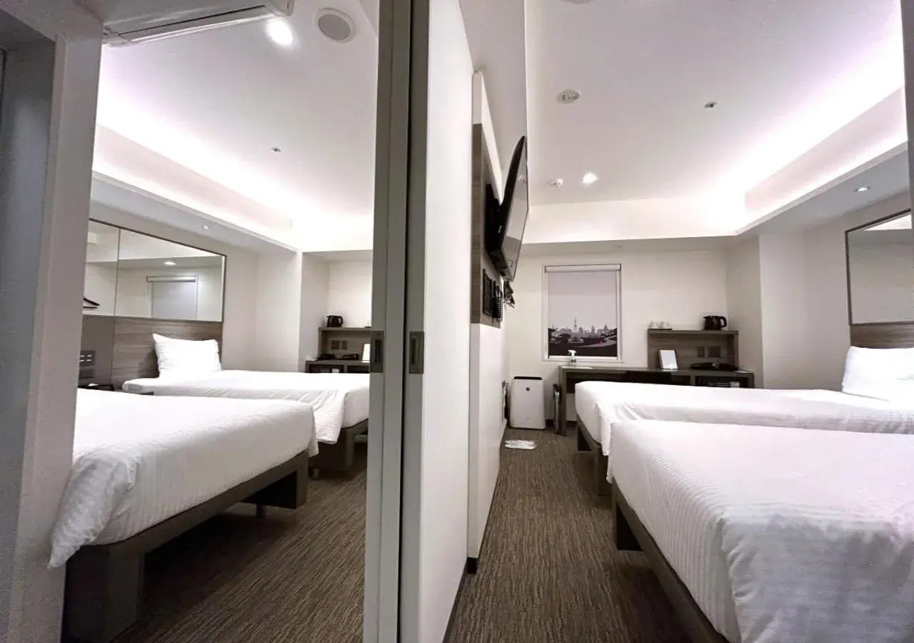 Photo of the whole room, Bed in Smile Hotel Sapporo Susukino Minami Photo of the whole room, Bed in Smile Hotel Sapporo Susukino Minami