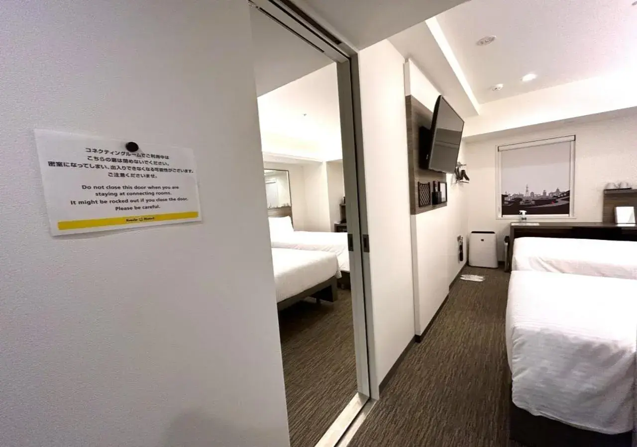 Photo of the whole room, Bed in Smile Hotel Sapporo Susukino Minami Photo of the whole room, Bed in Smile Hotel Sapporo Susukino Minami