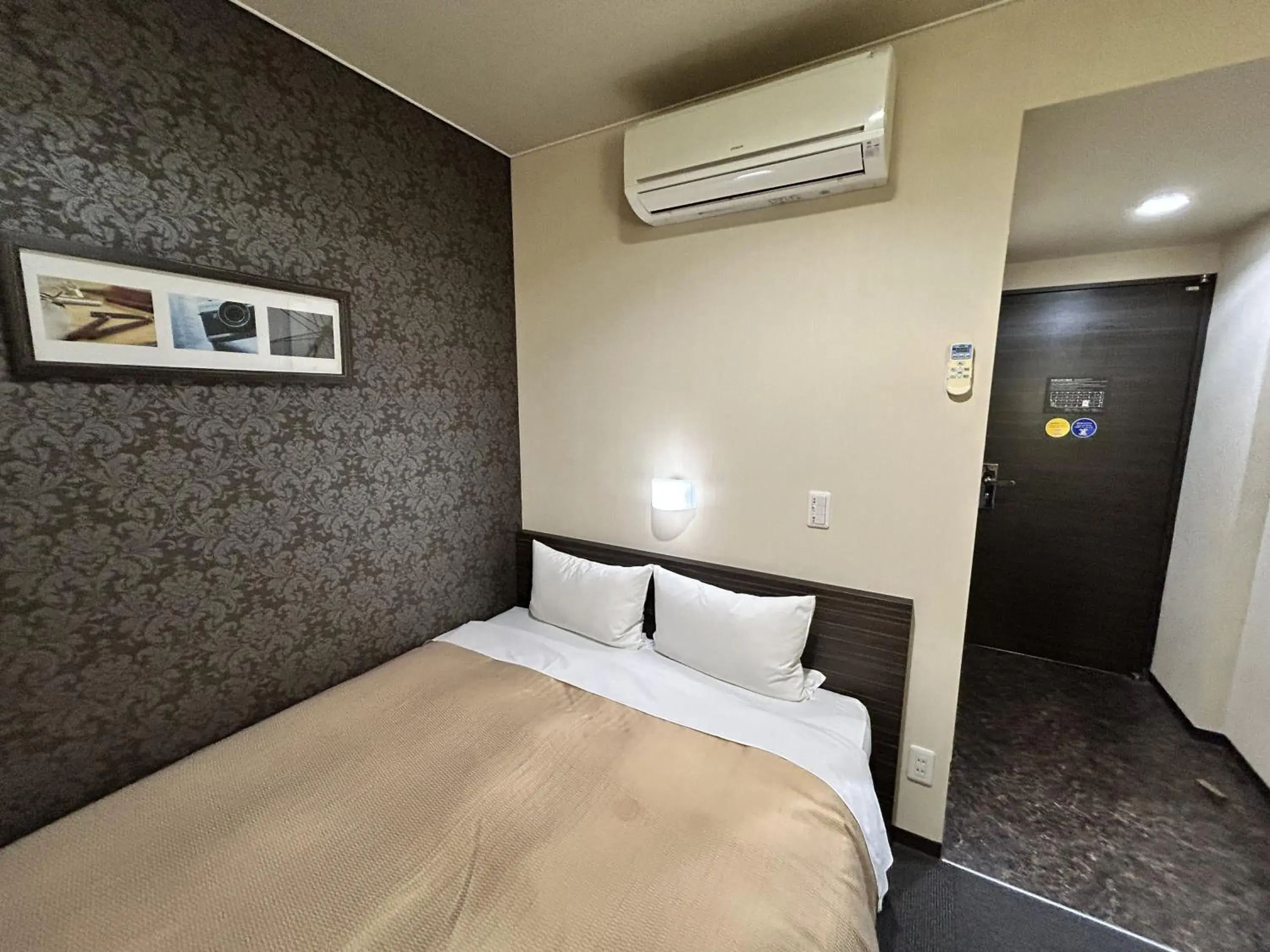 Bed in Smile Hotel Kokura Bed in Smile Hotel Kokura