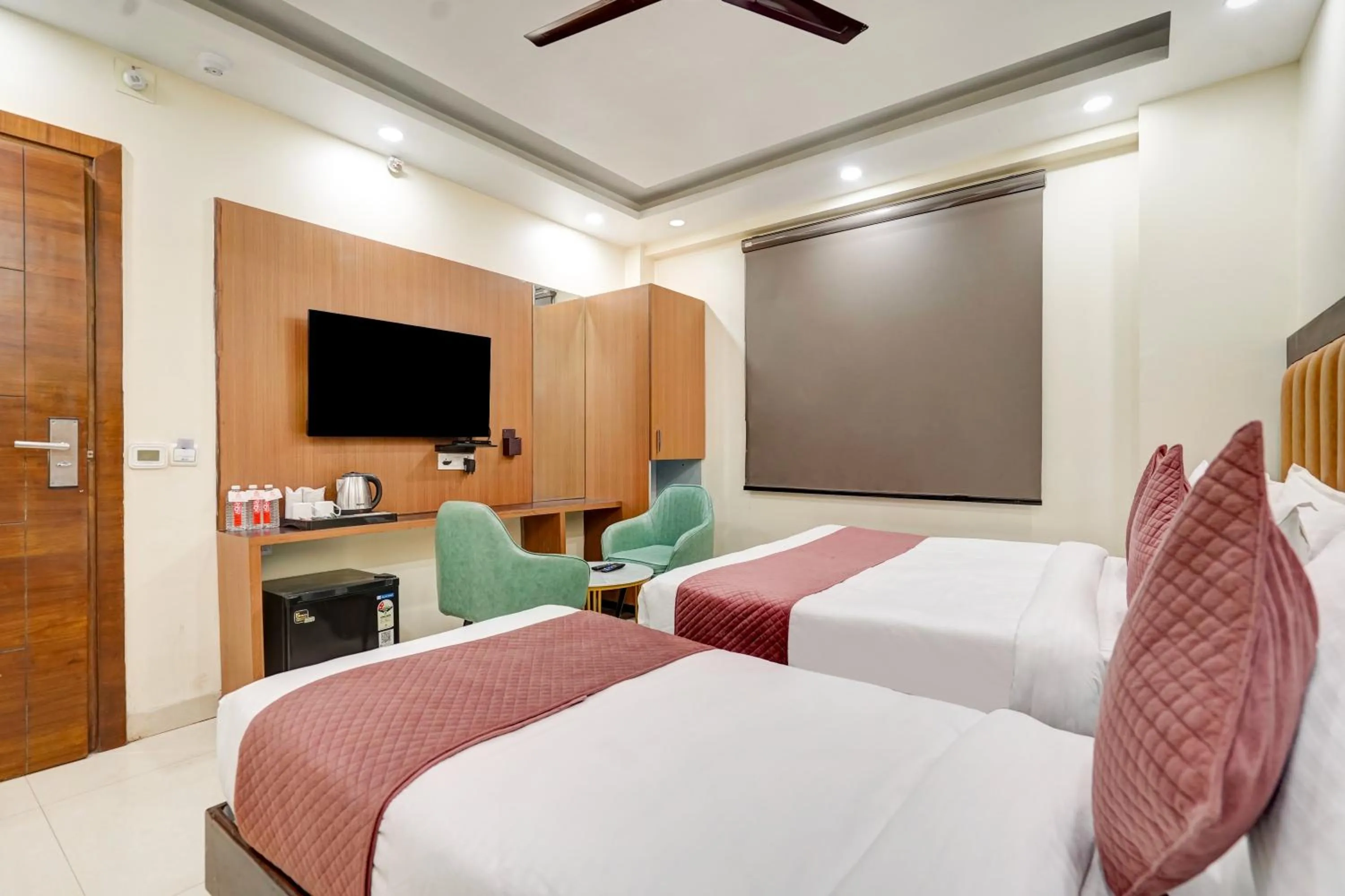 Photo of the whole room, Bed in Hotel Royal Rosette Near New Delhi Railway Station - Connaught Place and VFS