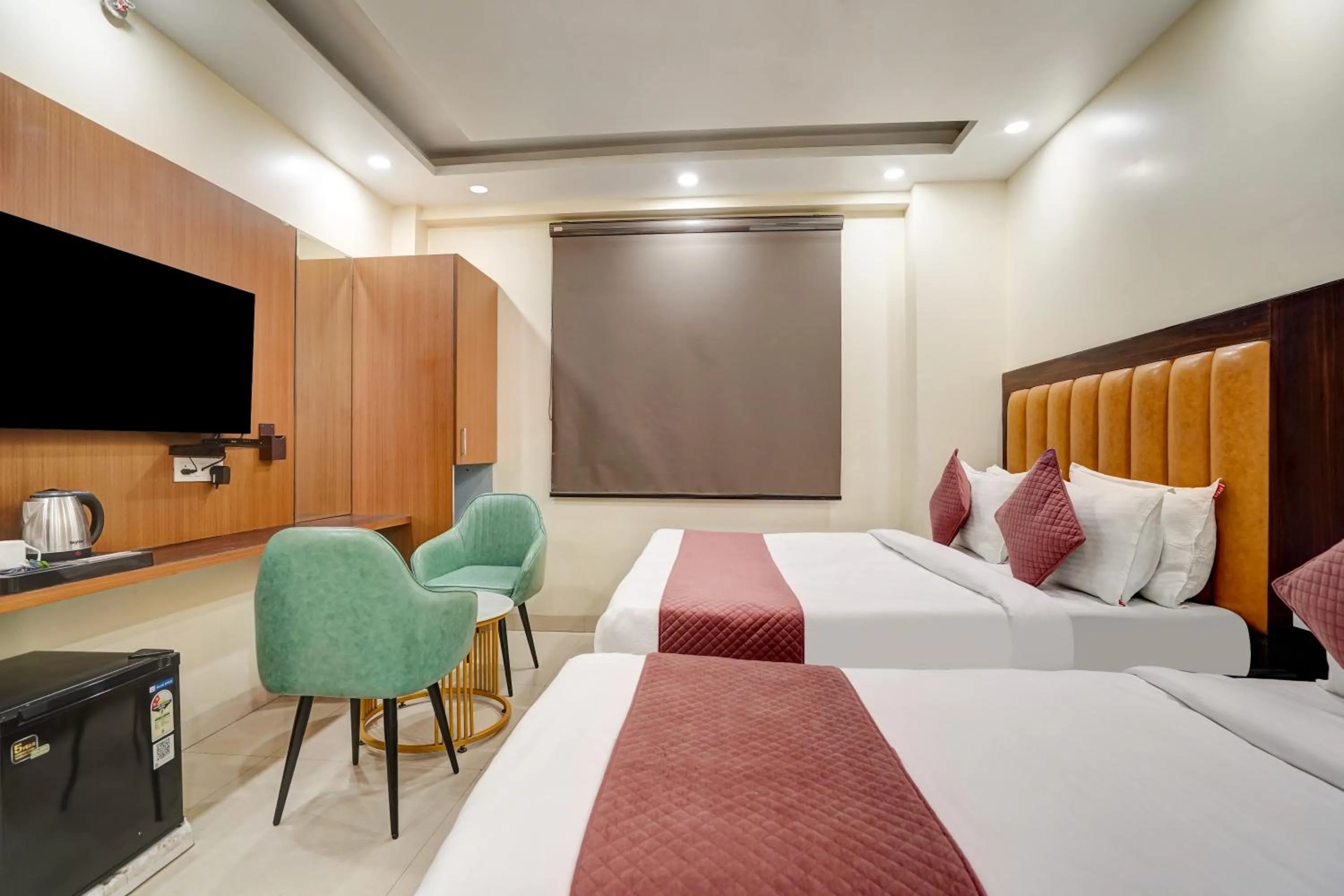 Photo of the whole room, Bed in Hotel Royal Rosette Near New Delhi Railway Station - Connaught Place and VFS