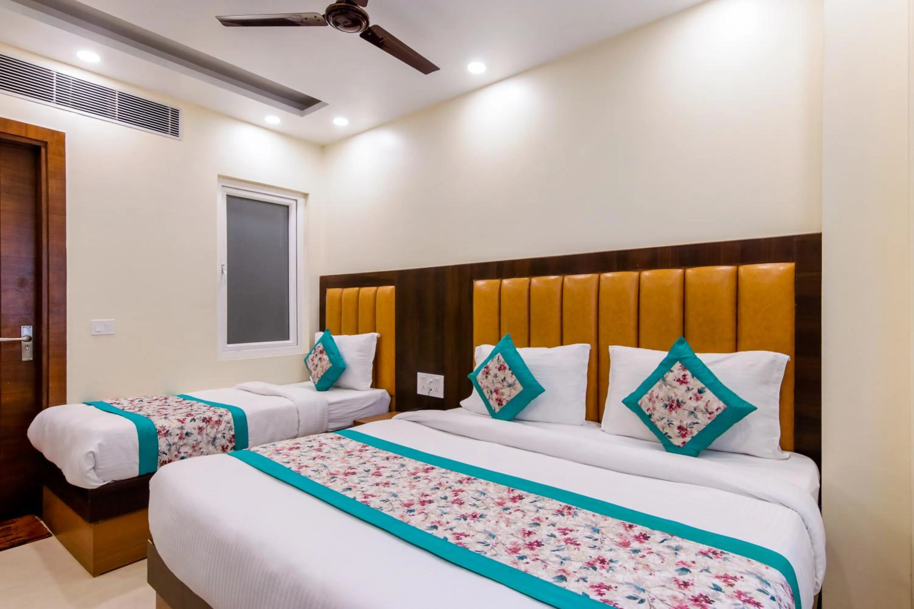 Photo of the whole room, Bed in Hotel Royal Rosette Near New Delhi Railway Station - Connaught Place and VFS