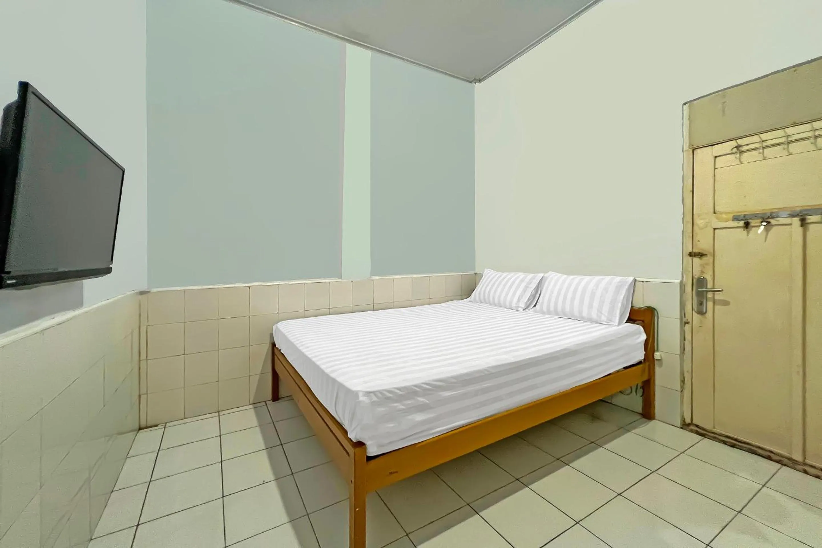 Bedroom, Bed in Hotel O Oma Homestay