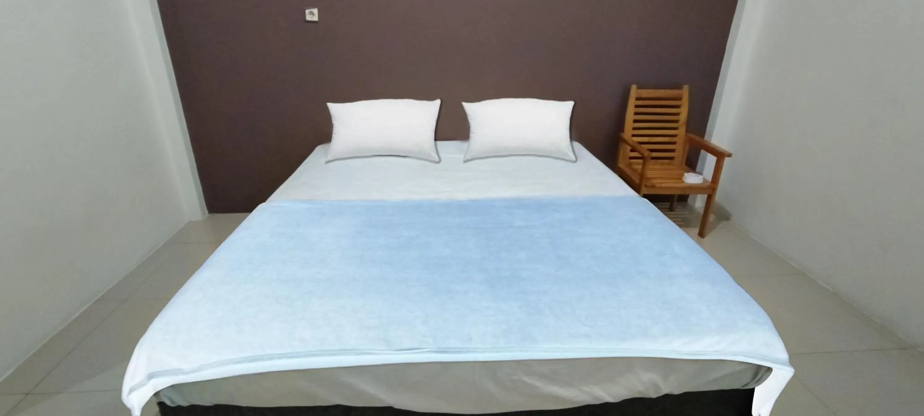 Bedroom, Bed in Hotel O Wisma Deli Syariah Near RSUD Nene Mallomo Sidenreng Rappang