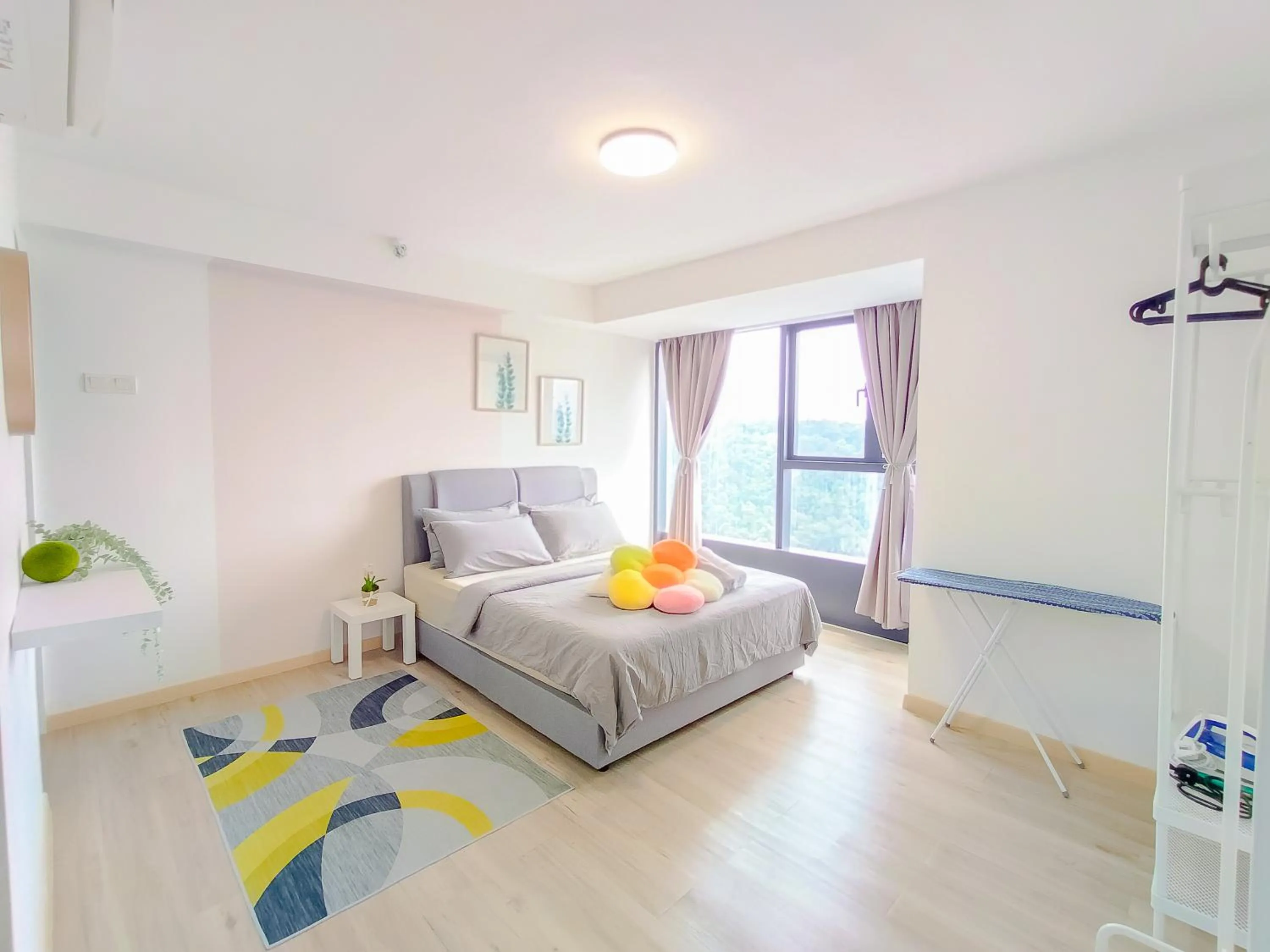 Bed in Empire City PJ Studio Suites by Manhattan Group