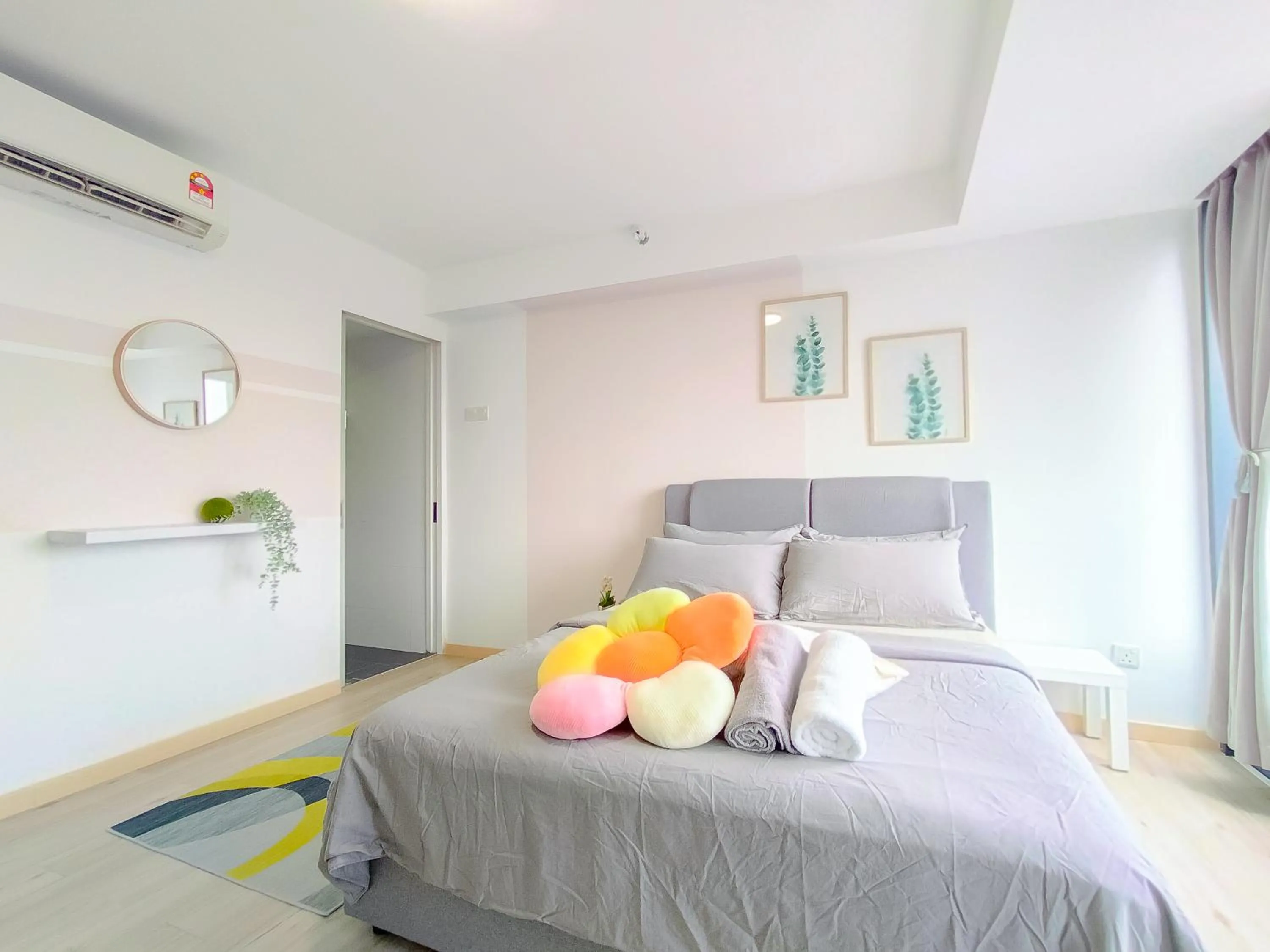 Bed in Empire City PJ Studio Suites by Manhattan Group