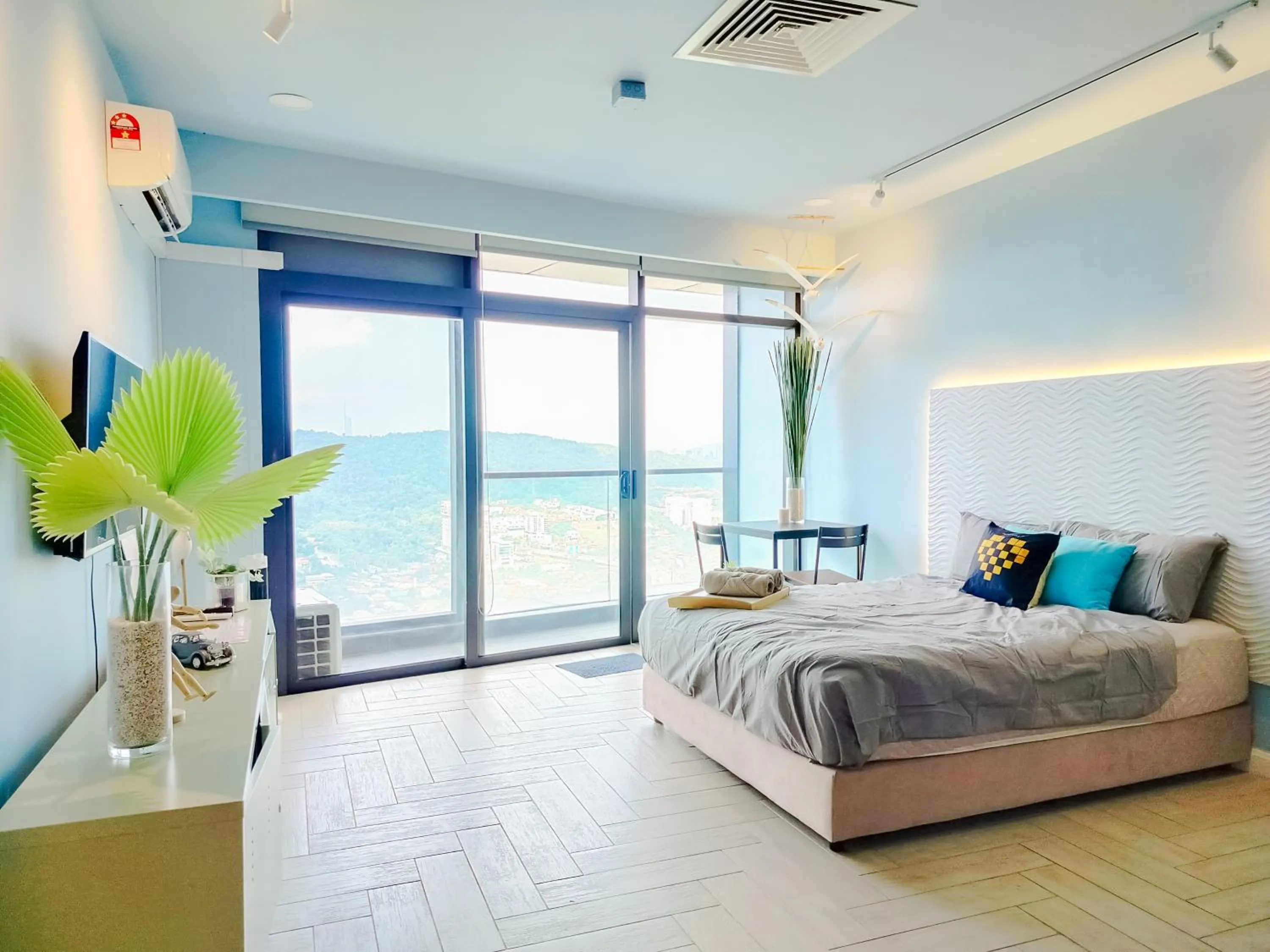 Bed in Empire City PJ Studio Suites by Manhattan Group