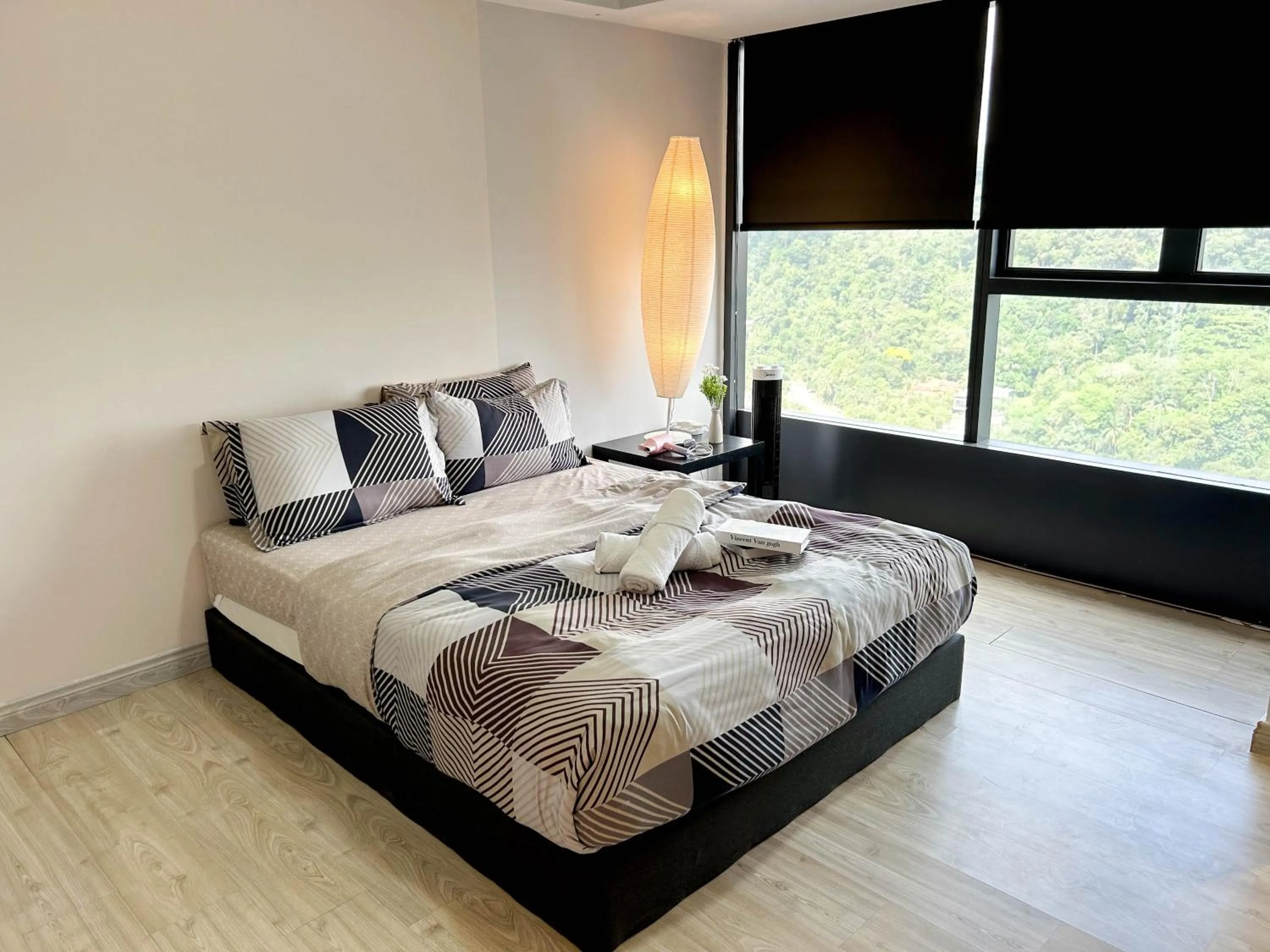 Bed in Empire City PJ Studio Suites by Manhattan Group