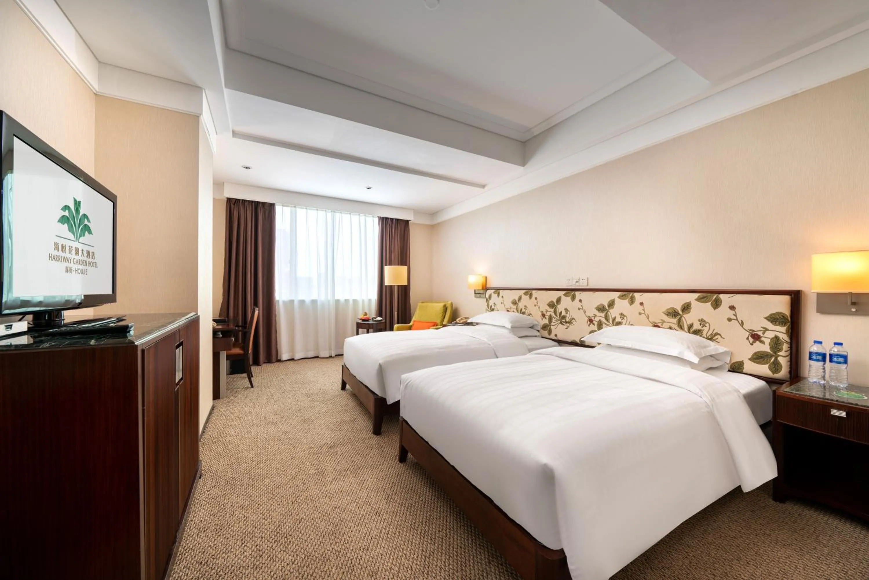 Bed in Harriway Garden Hotel Houjie