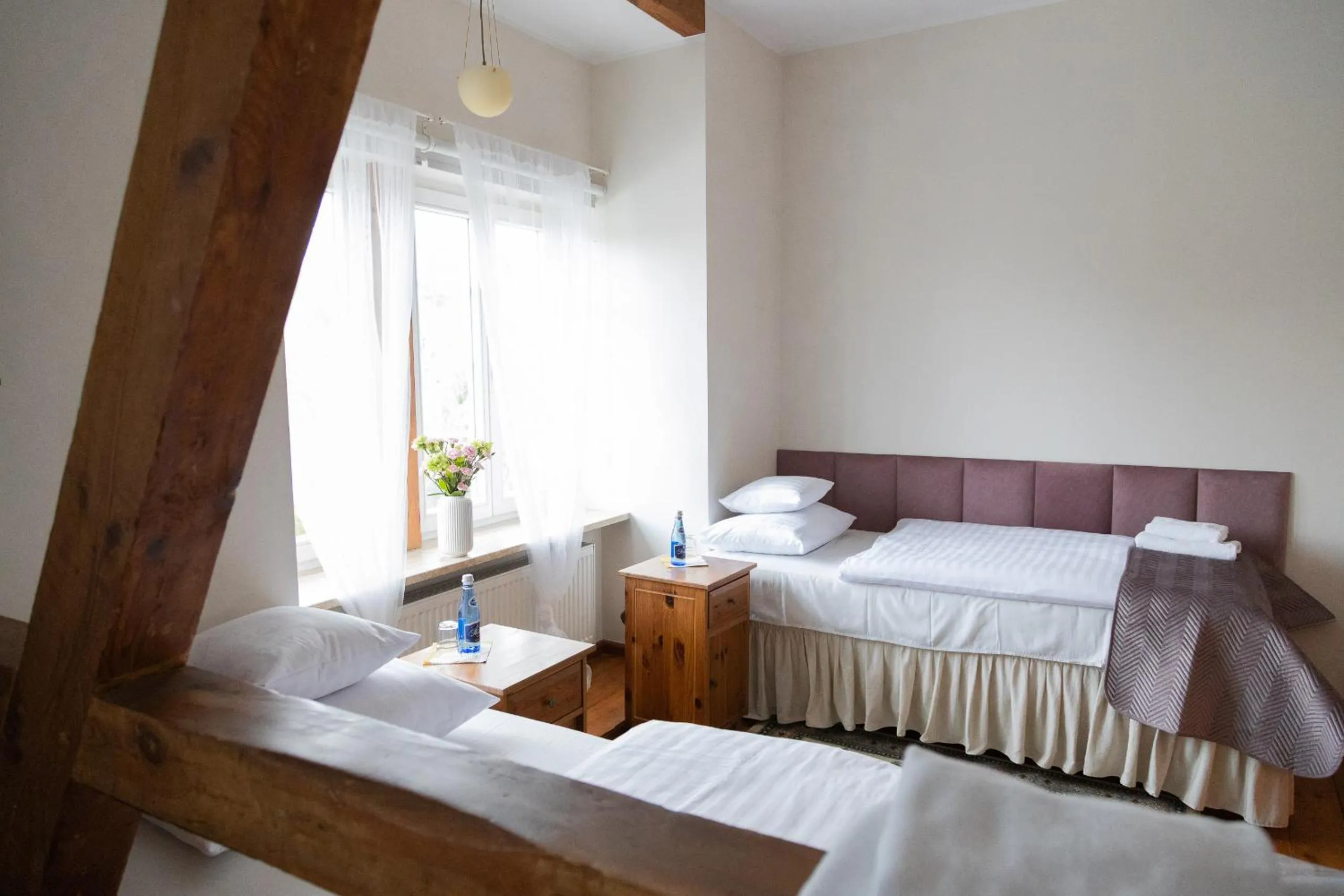 Bed in Mleczarnia Hotel Restauracja