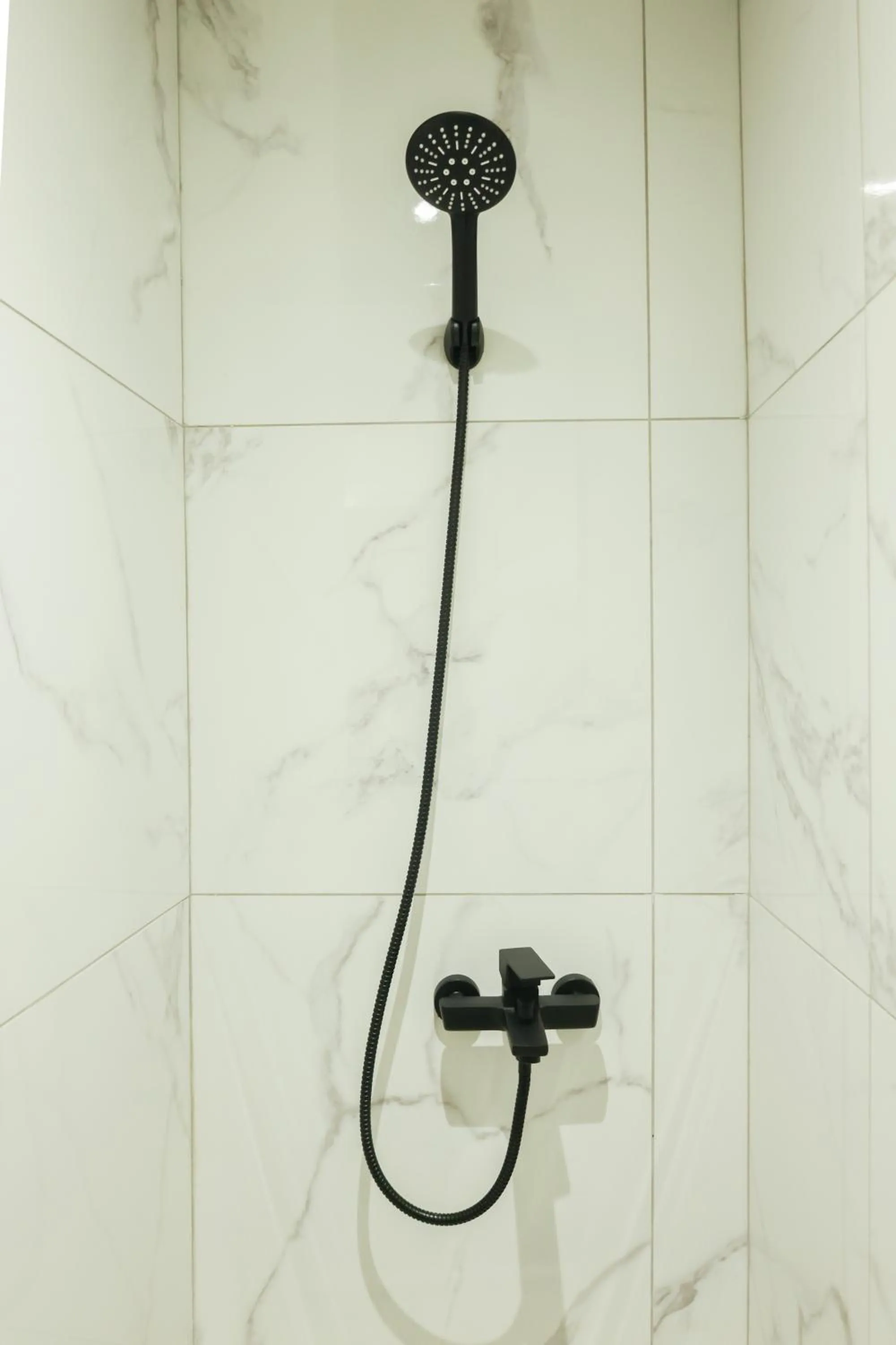 Shower in Uphill Unique Boutique Suites