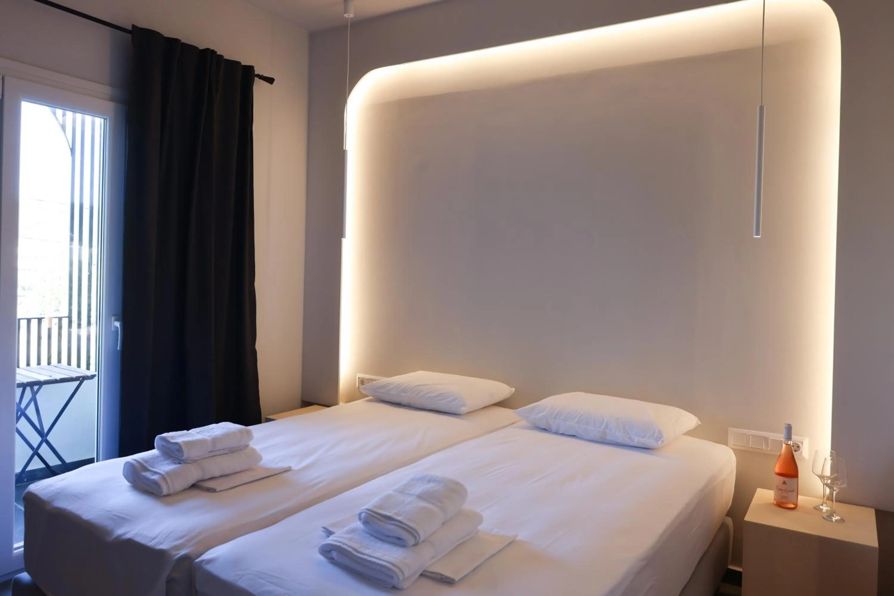 Bed in Uphill Unique Boutique Suites