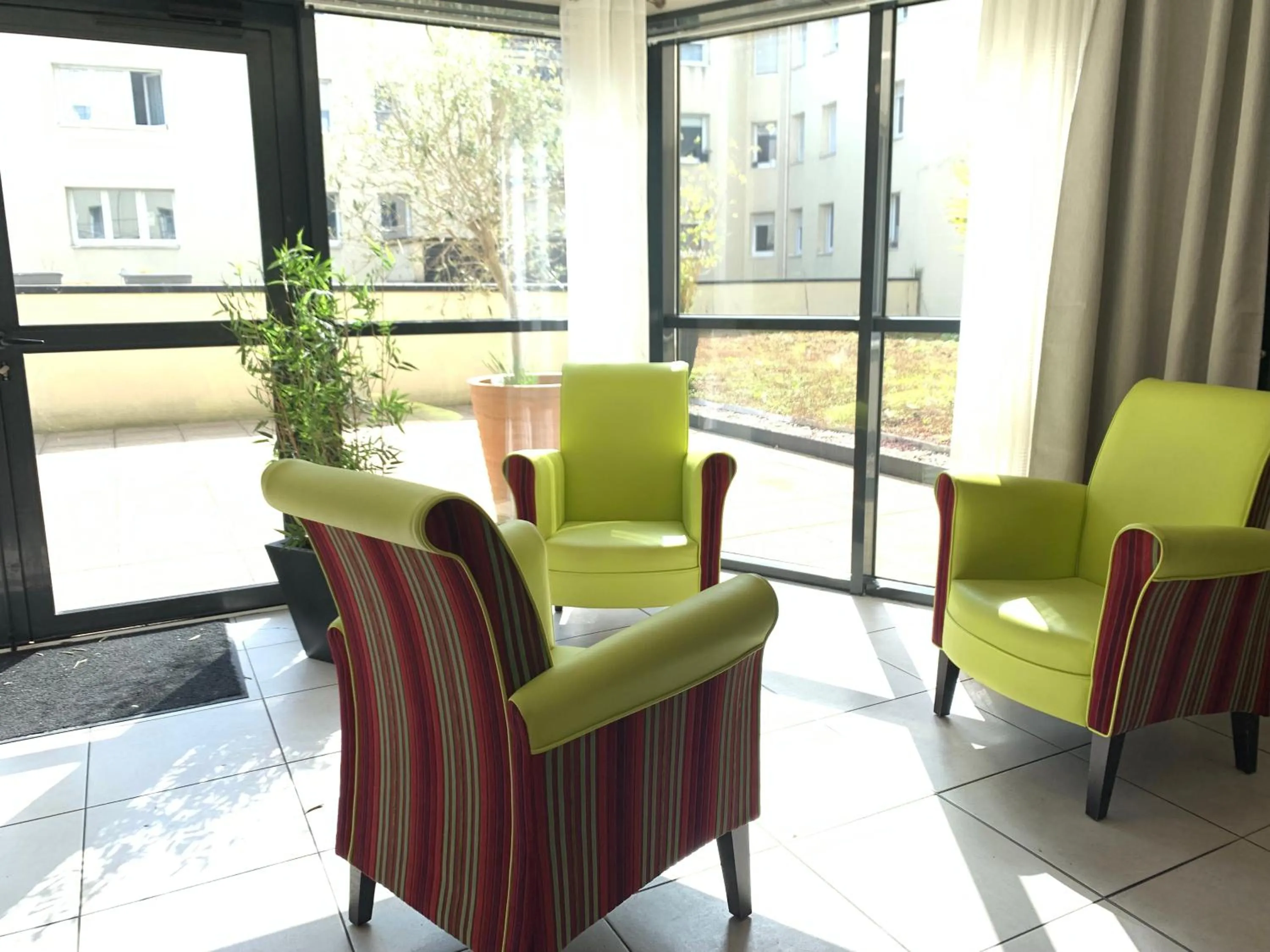 Living room in Terres de France - Appart Hôtel Rouen Flaubert