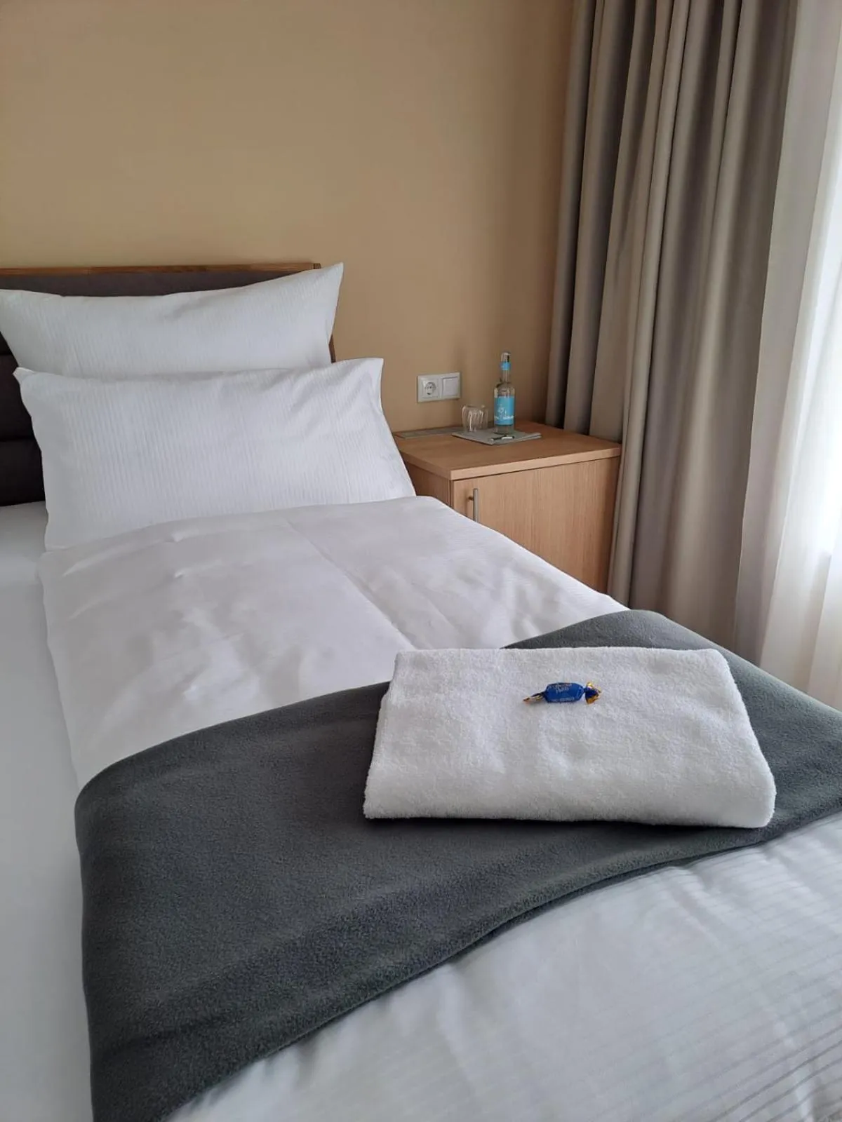 Bed in Hotel Rhin Inn