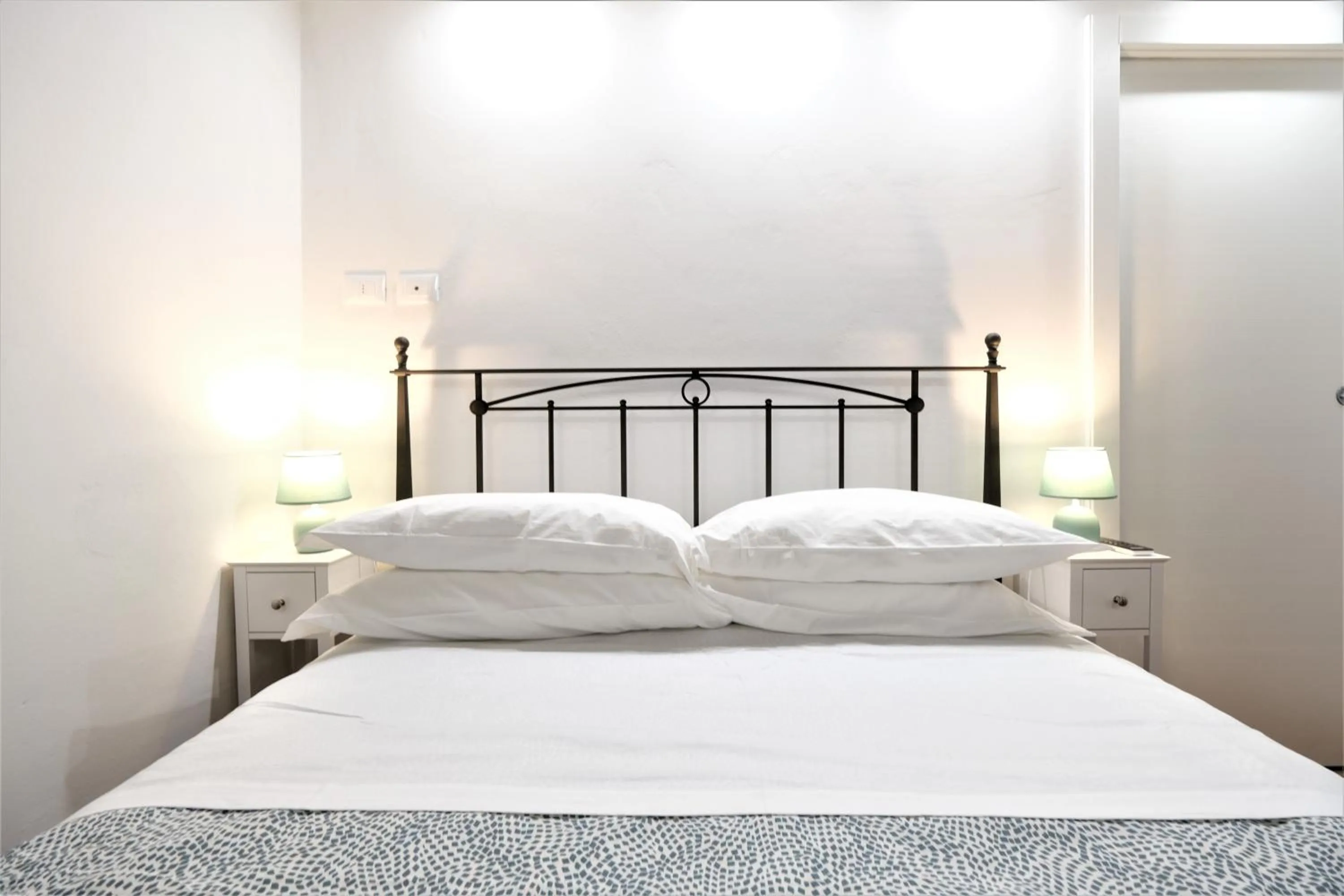 Bed in Wine Apartments Florence Ribolla