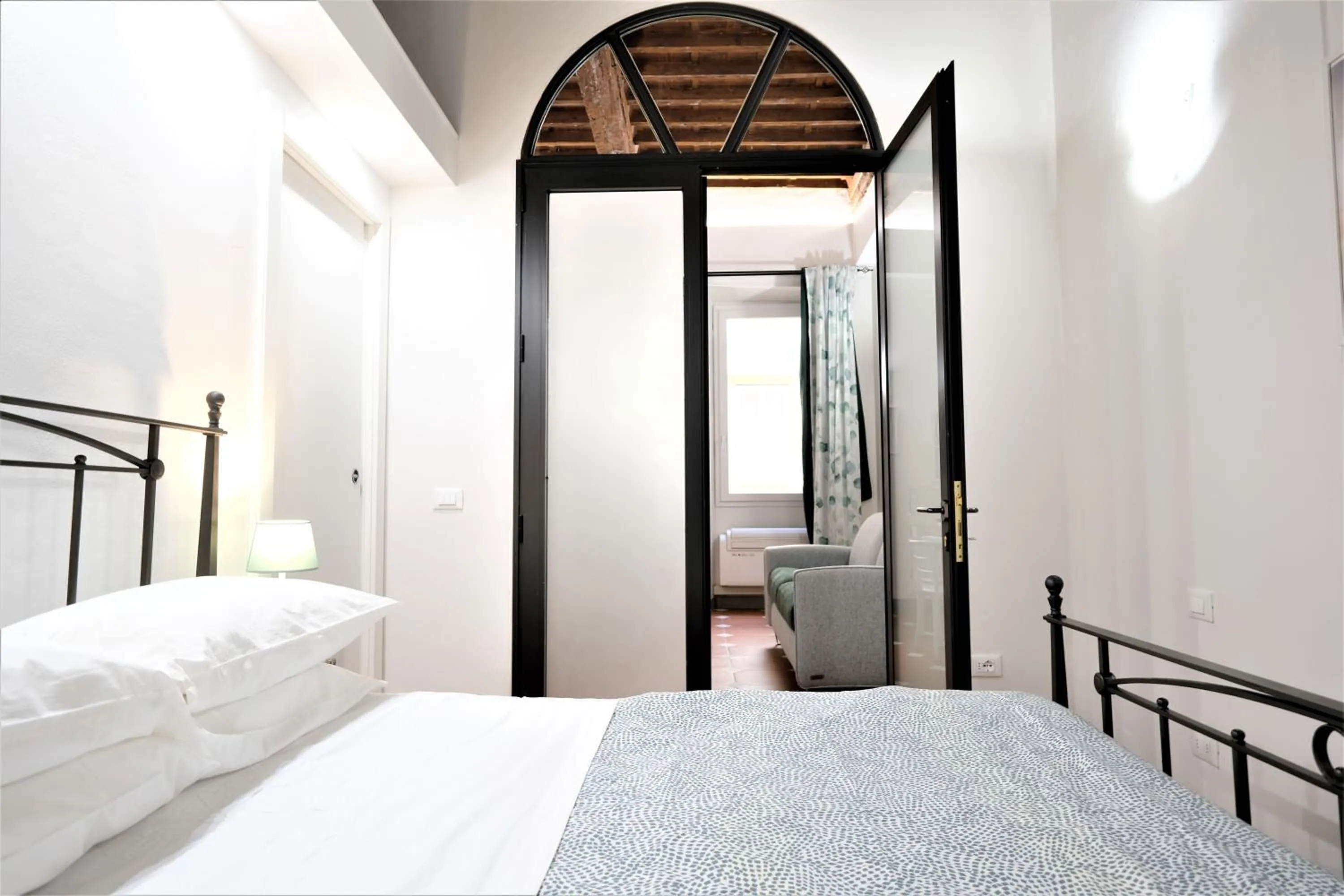 Bed in Wine Apartments Florence Ribolla