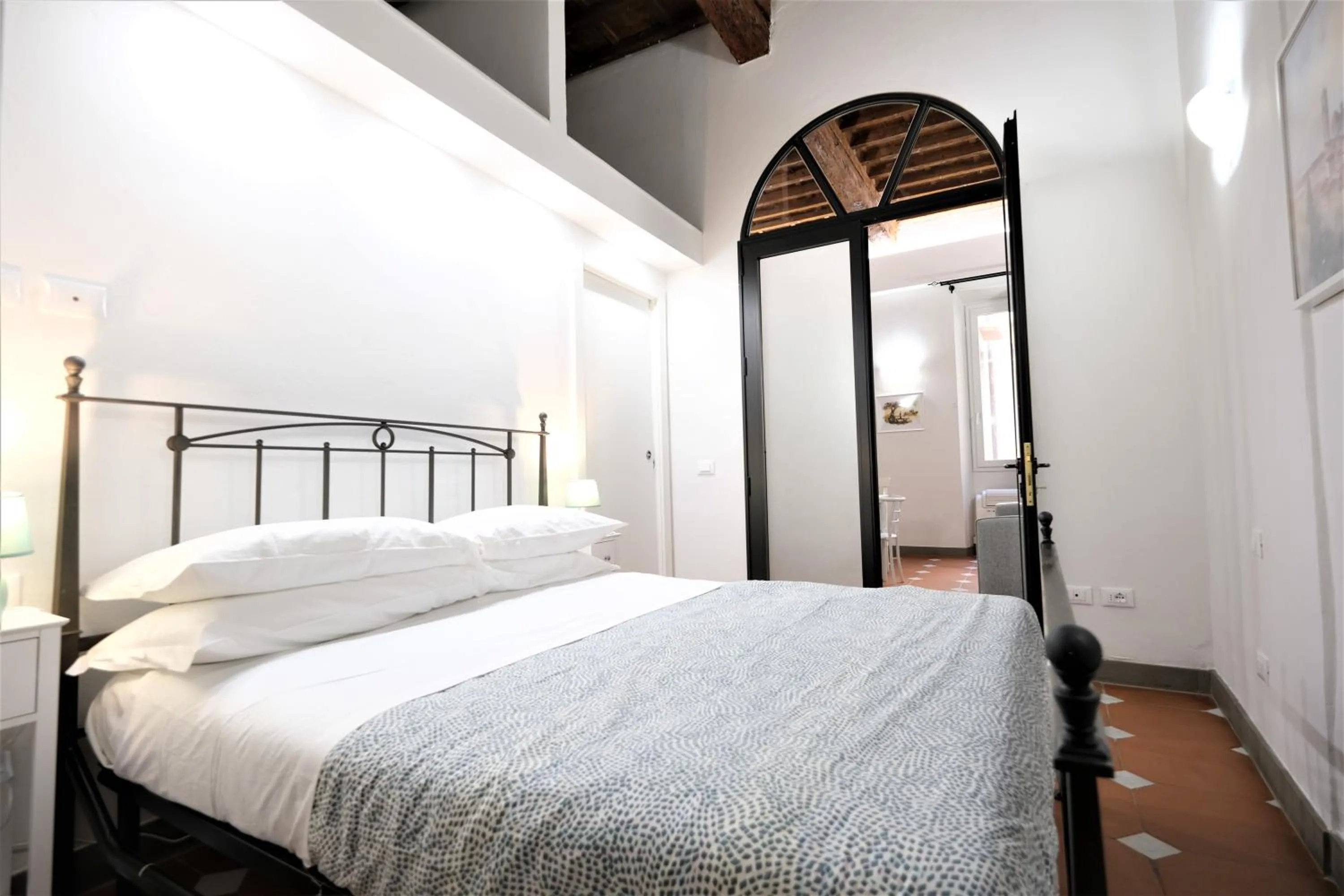 Bed in Wine Apartments Florence Ribolla