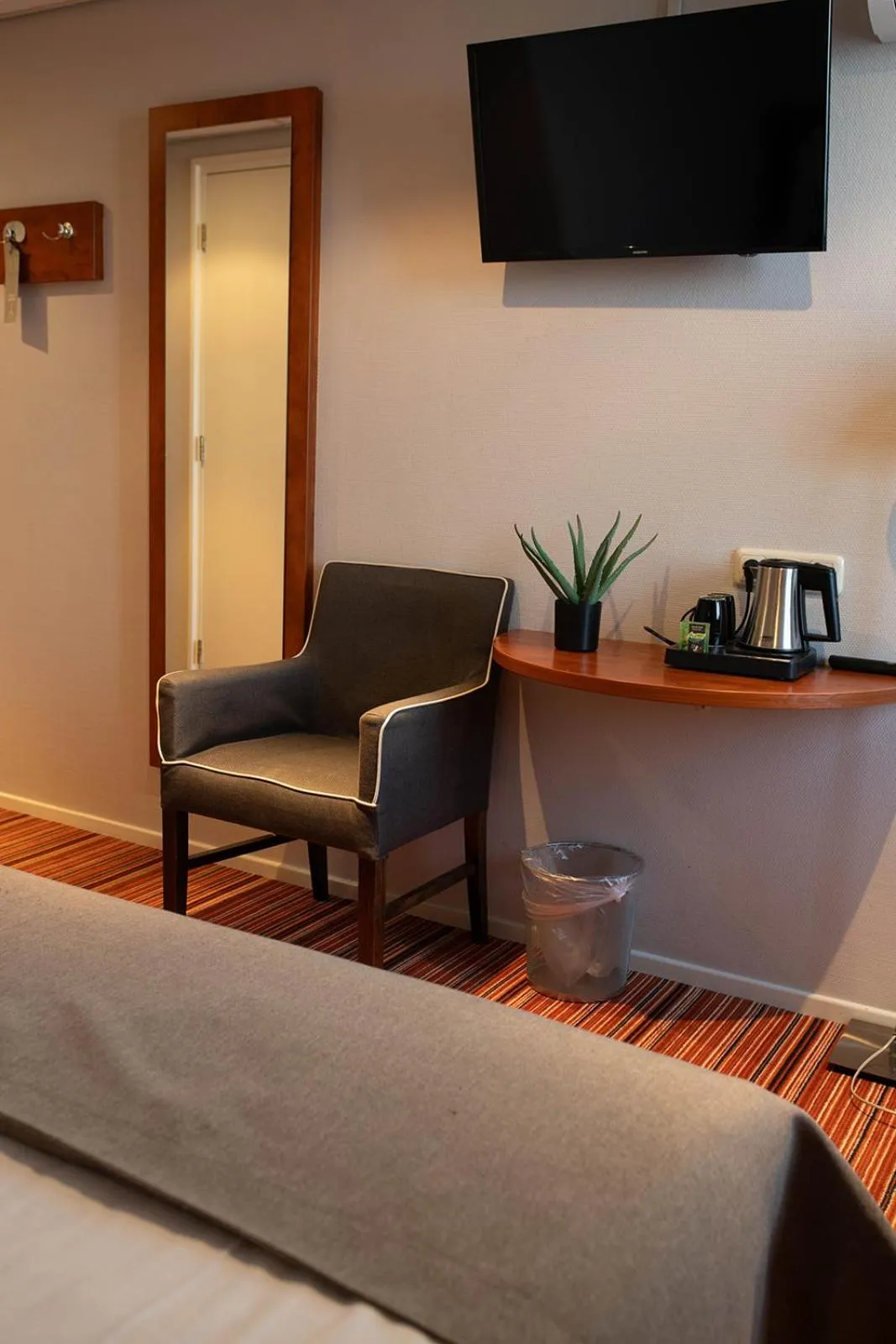 Bedroom in Hotel Restaurant De Zwaan